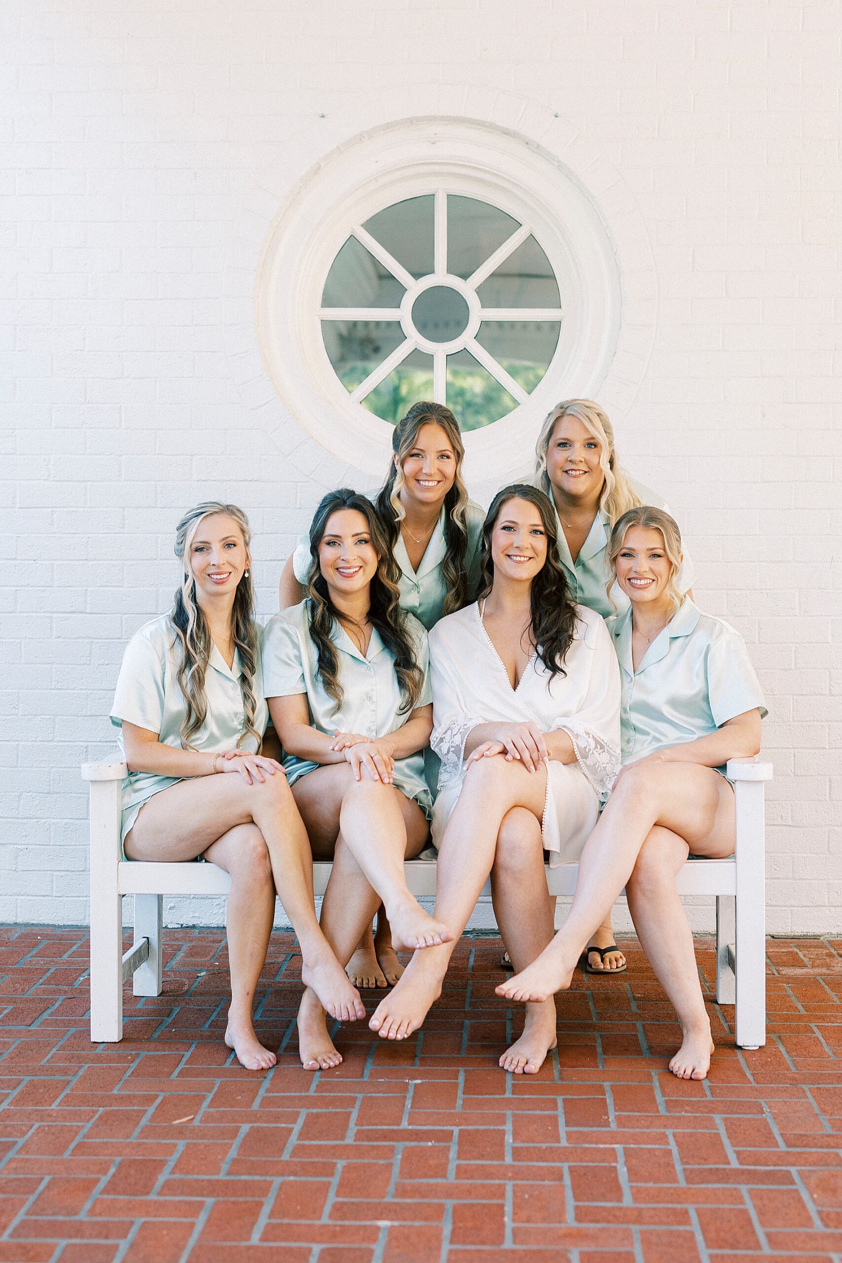 bride with bridesmaids in matching robes