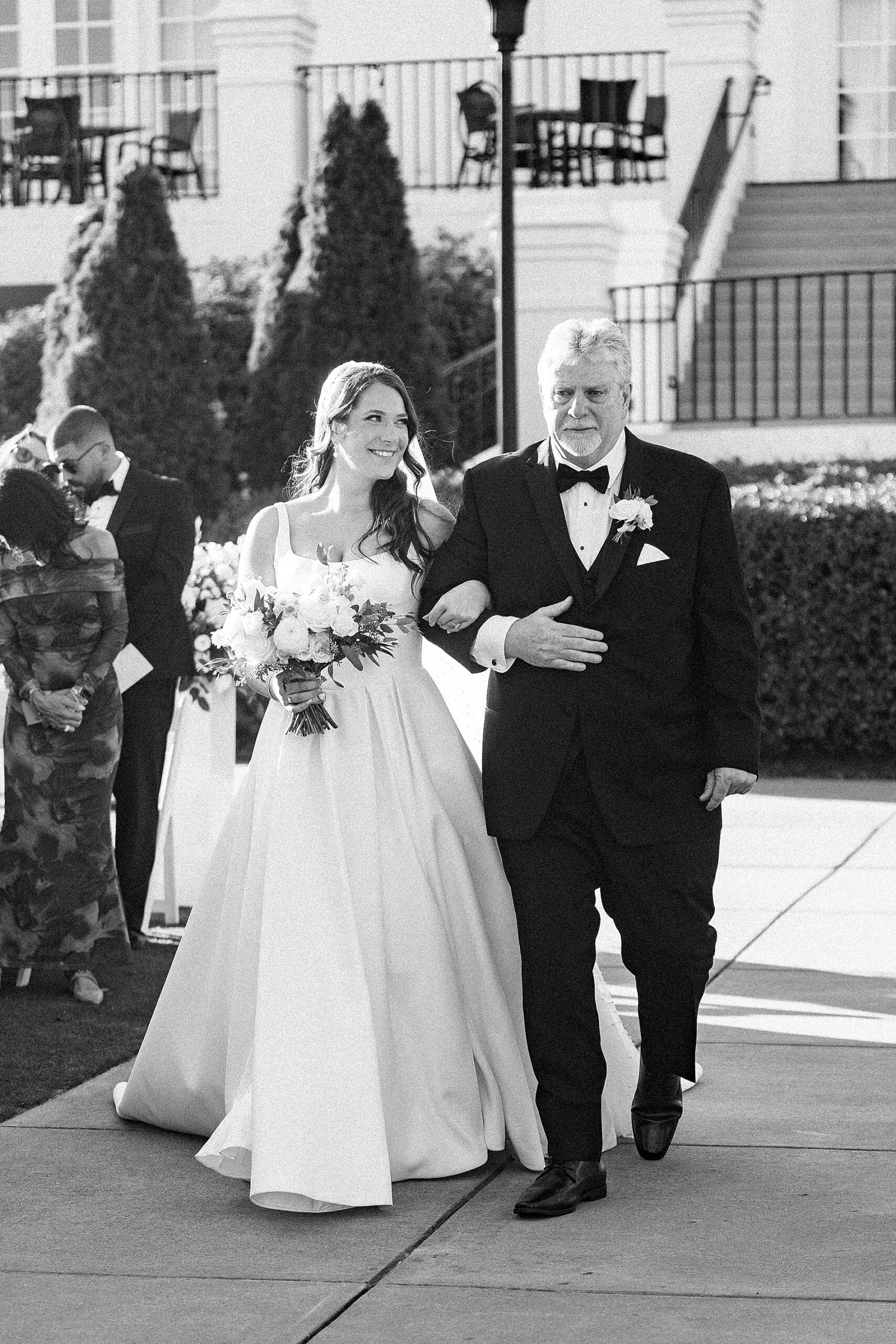 father walks daughter down the aisle 