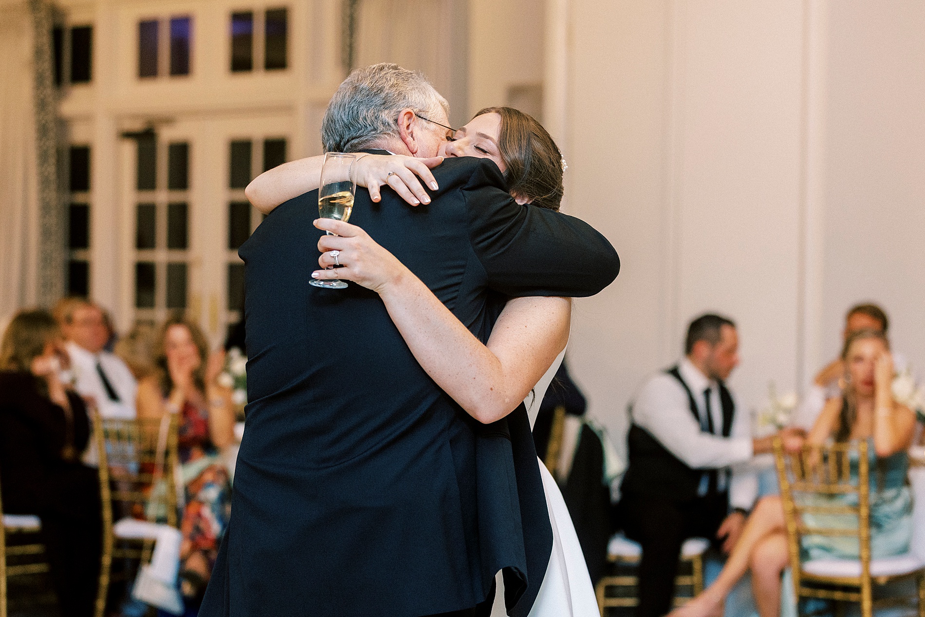 bride hugs father 