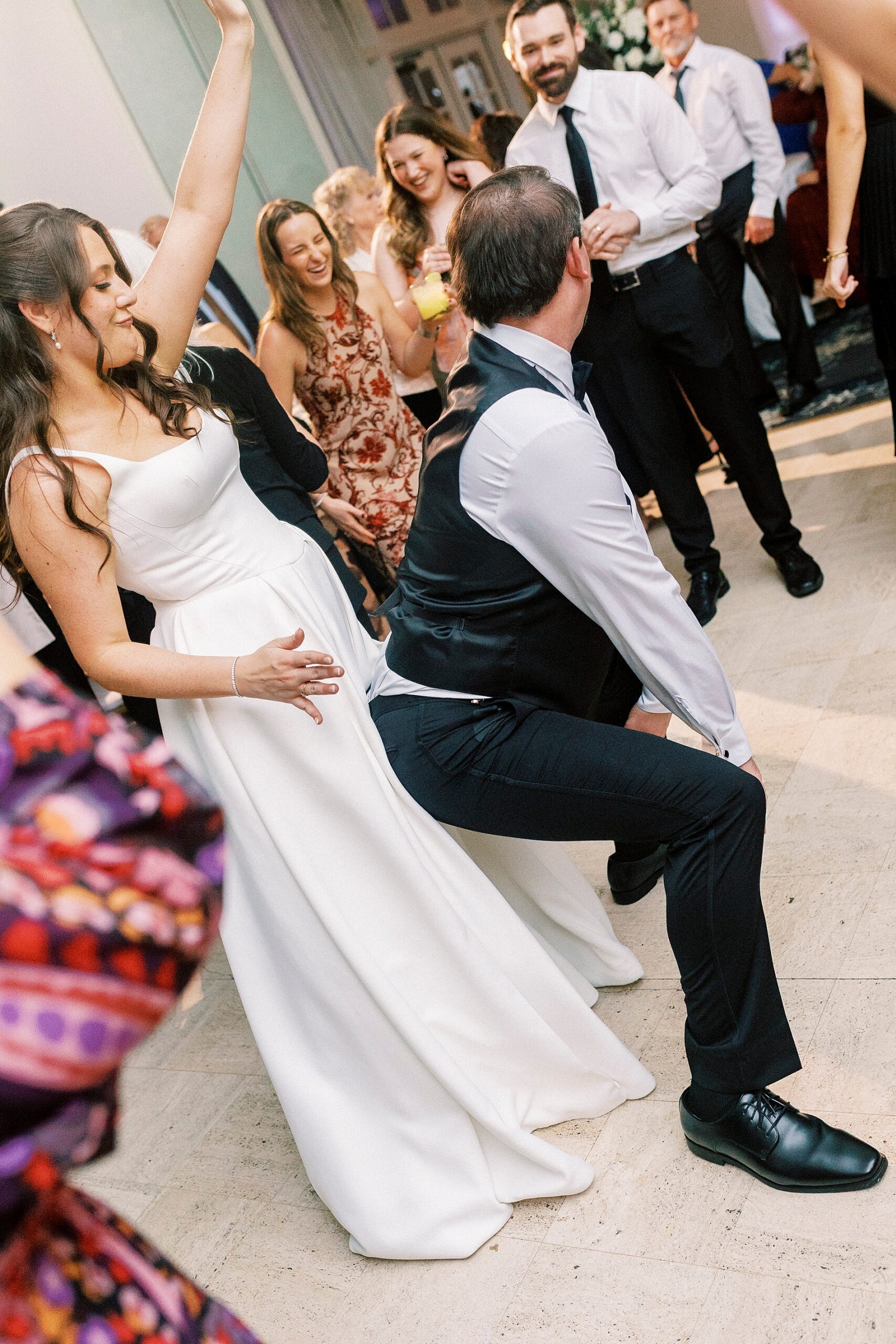 groom dances with bride 