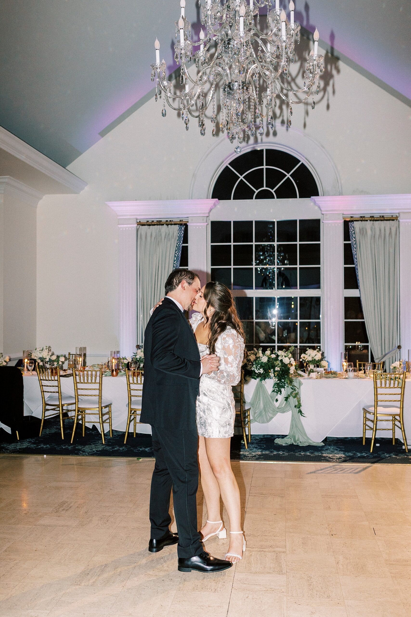 newlyweds share last dance at wedding reception 