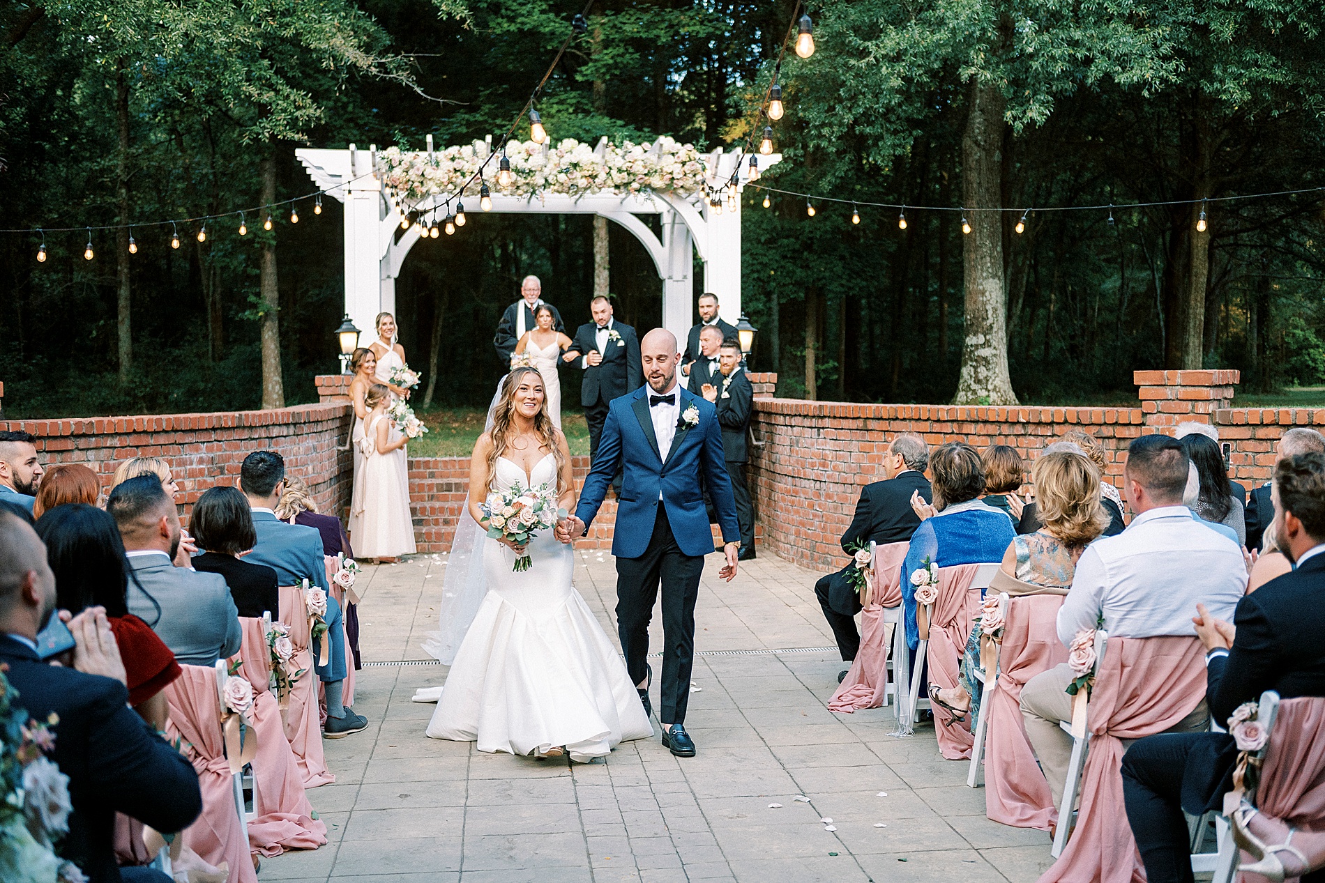 newlyweds exit wedding ceremony
