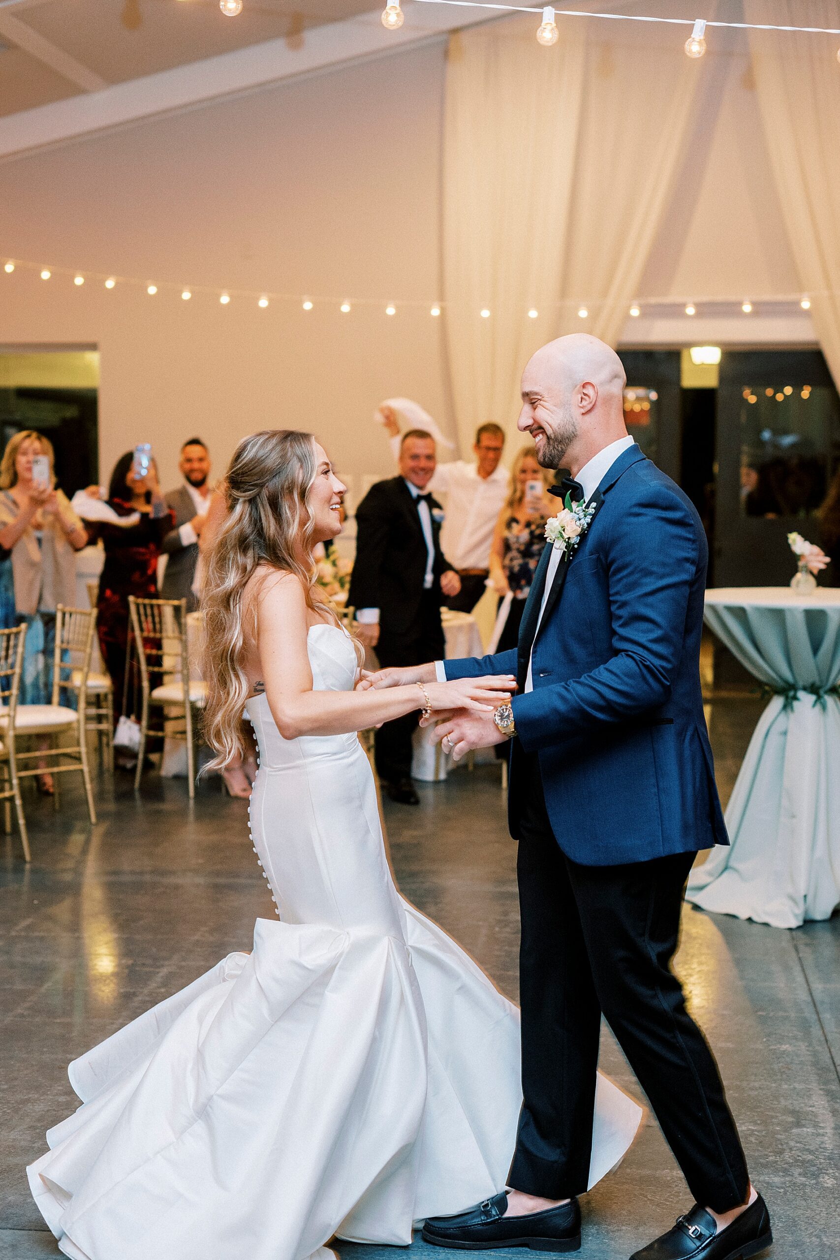 newlyweds dancing at wedding reception