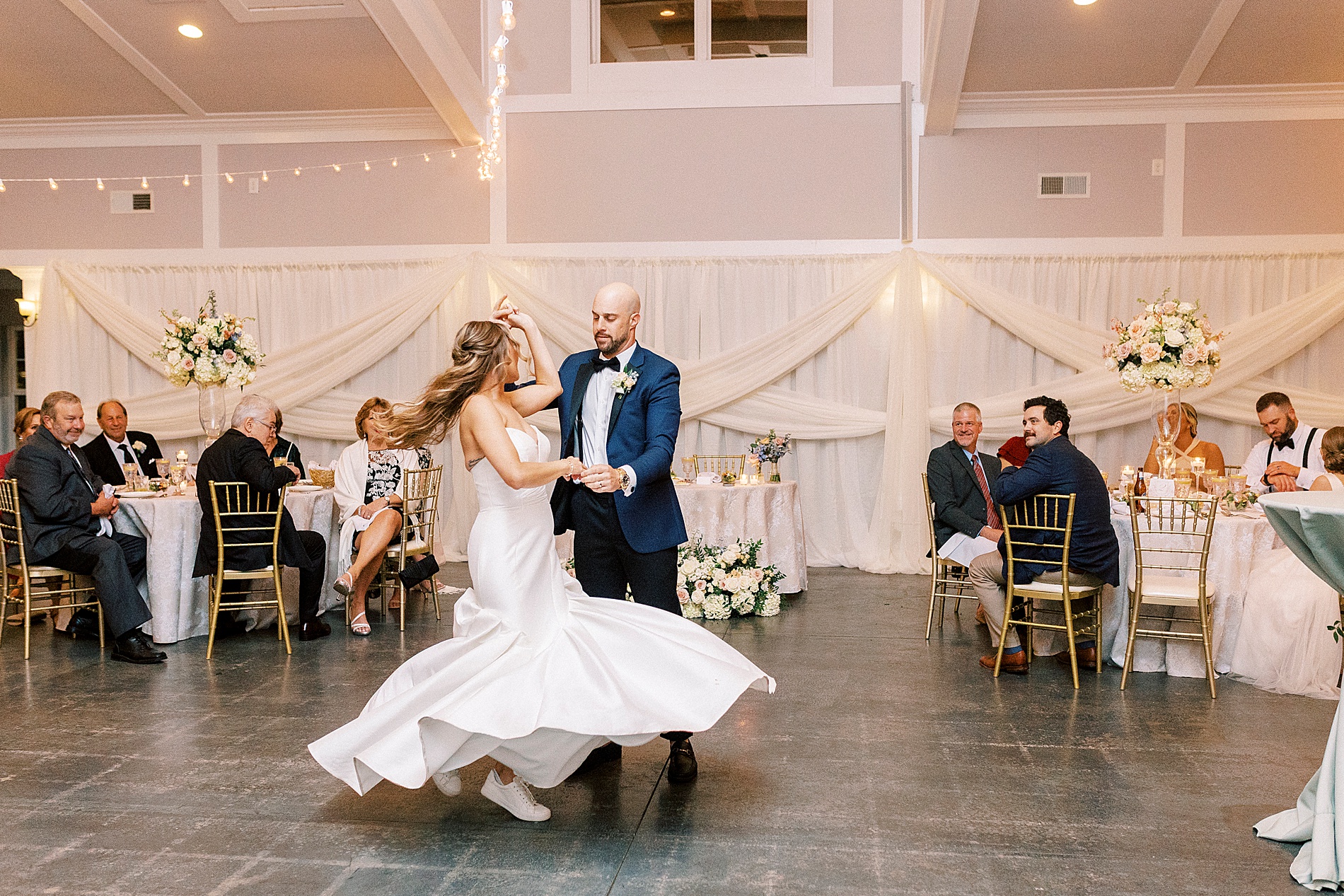 bride and groom share first dance