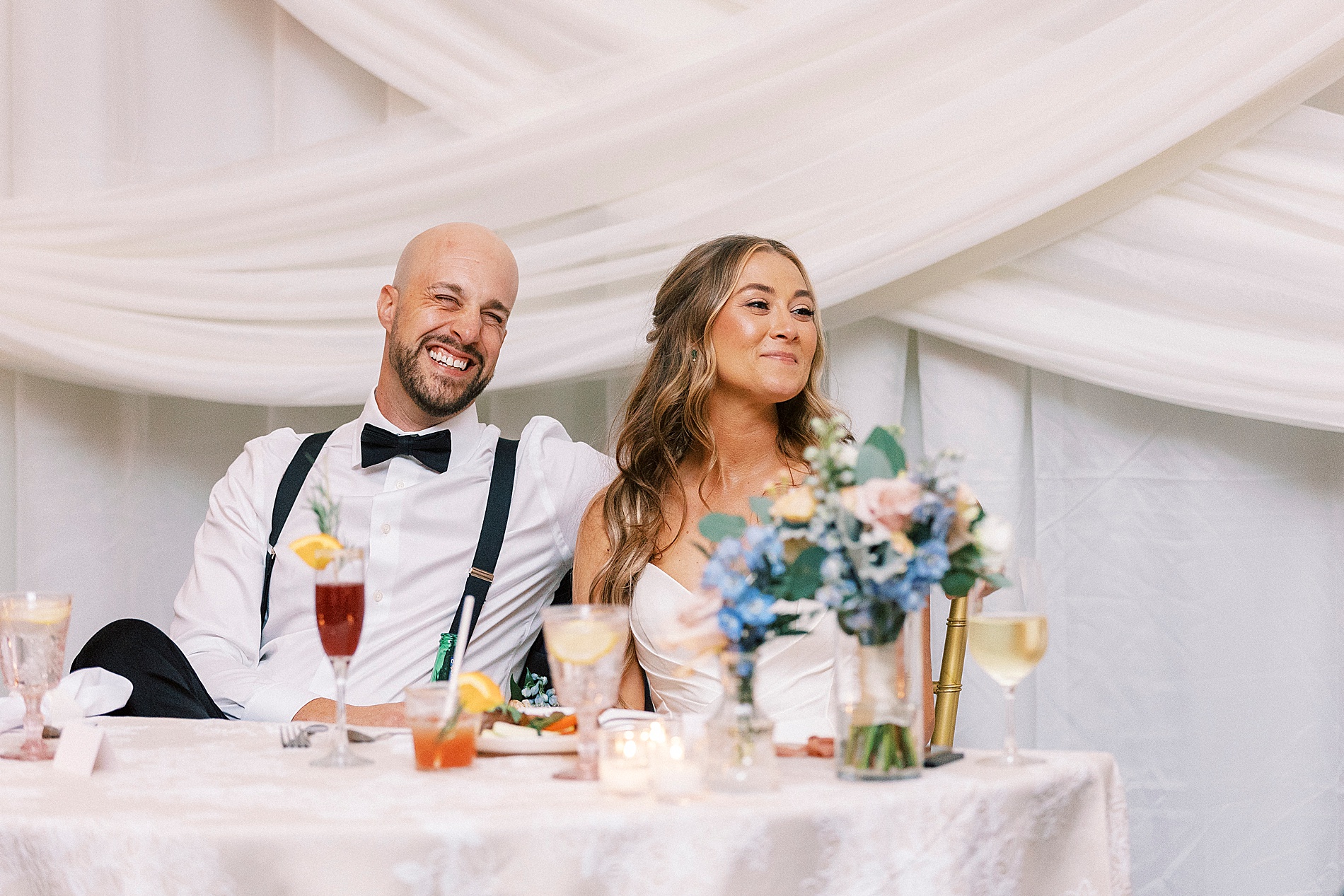 candid photos of couple listening to toasts