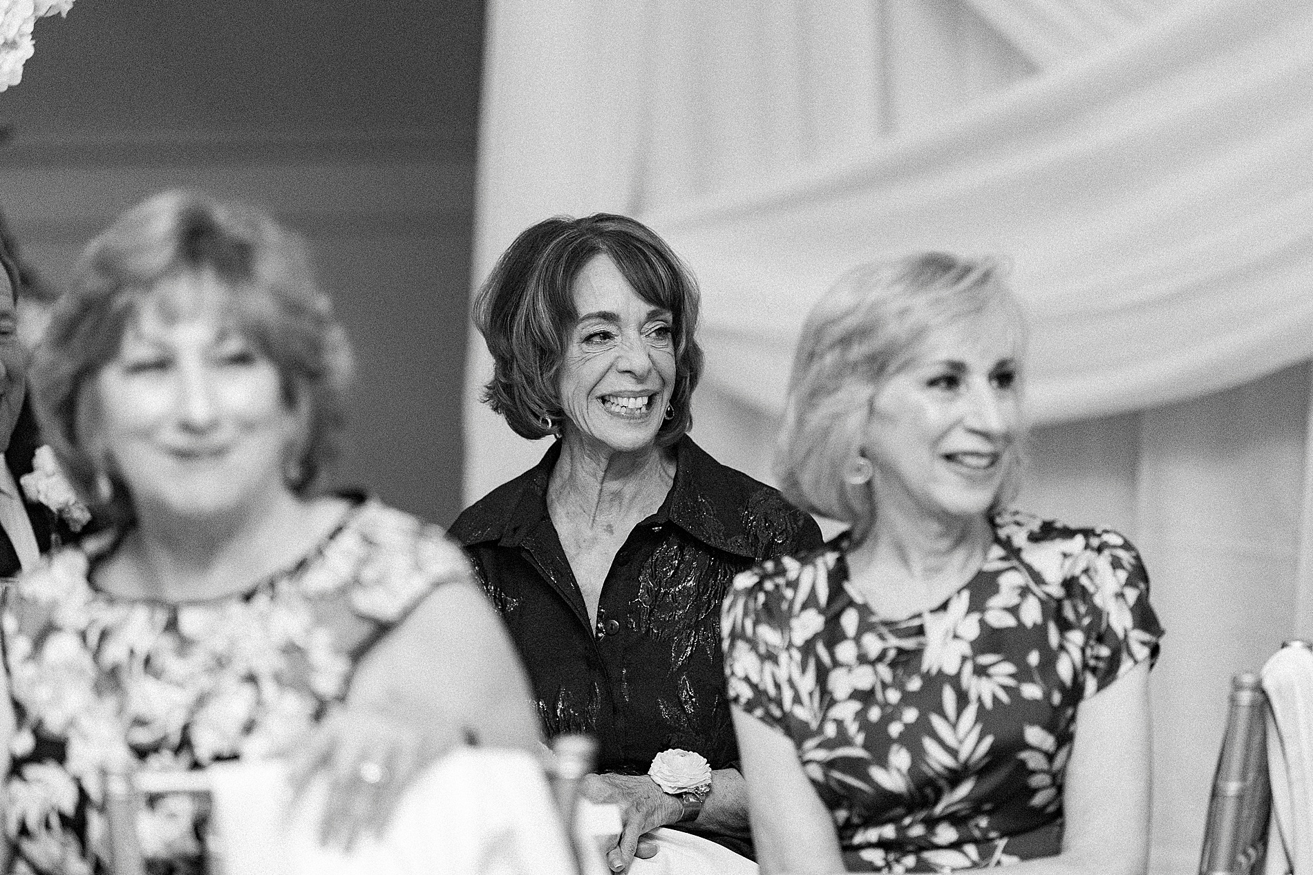 candid portraits of guests listening to speeches