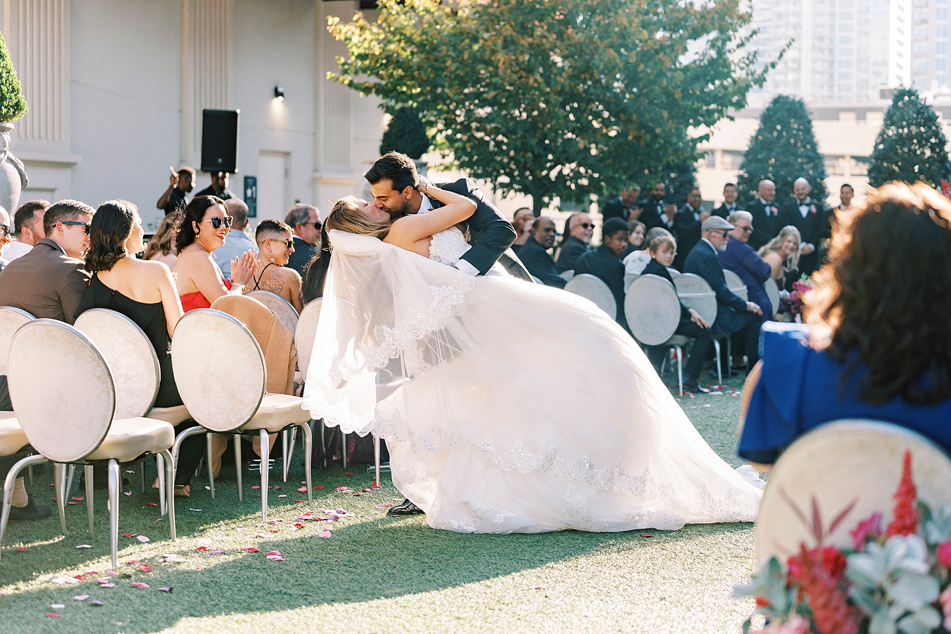 newlyweds kiss at wedding ceremony 