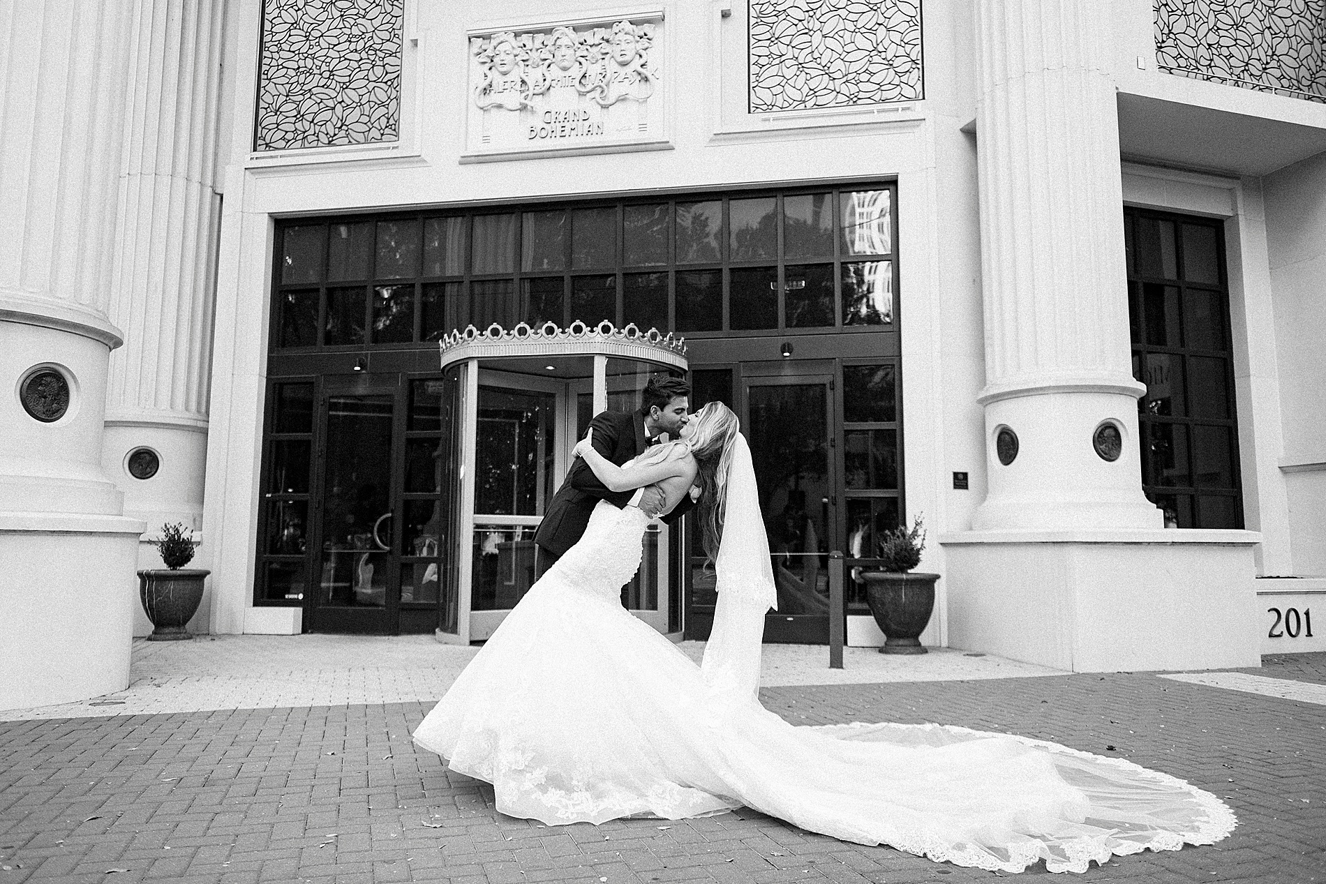 Timeless wedding portraits outside of The Grand Bohemian Hotel in Uptown Charlotte, NC