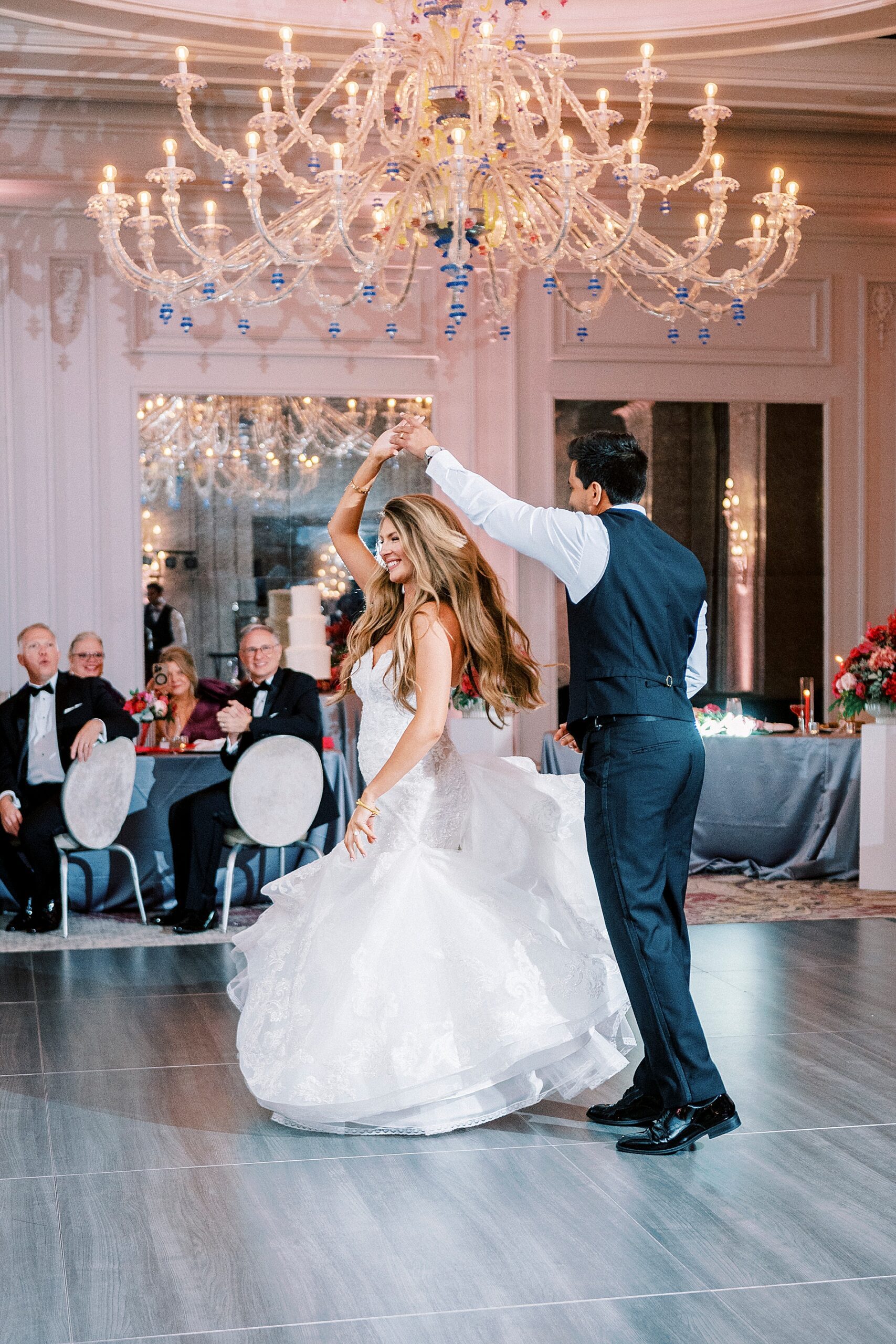 bride and groom share first dance at wedding 