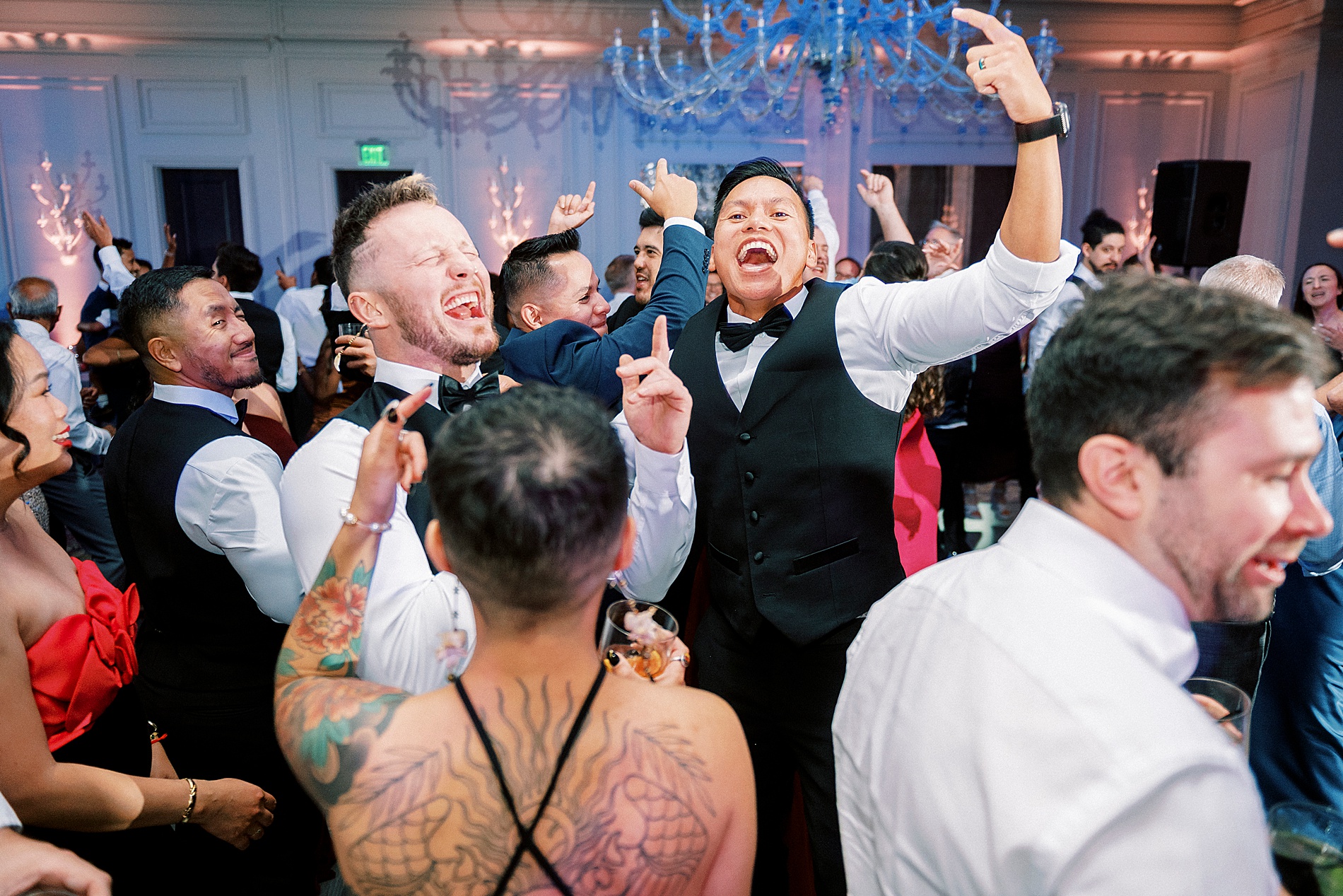 wedding guests on dance floor 
