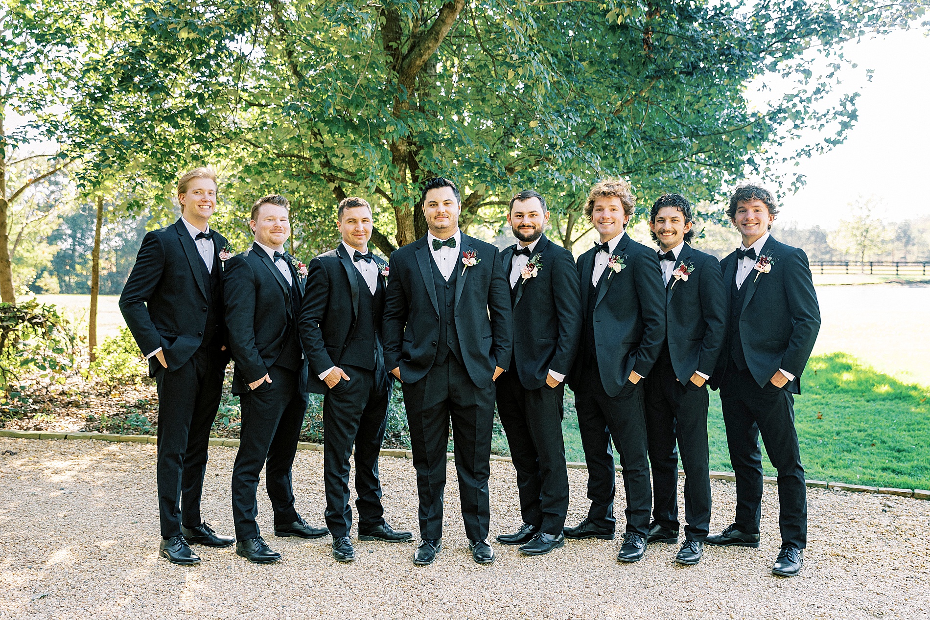 groom and groomsmen in tuxes