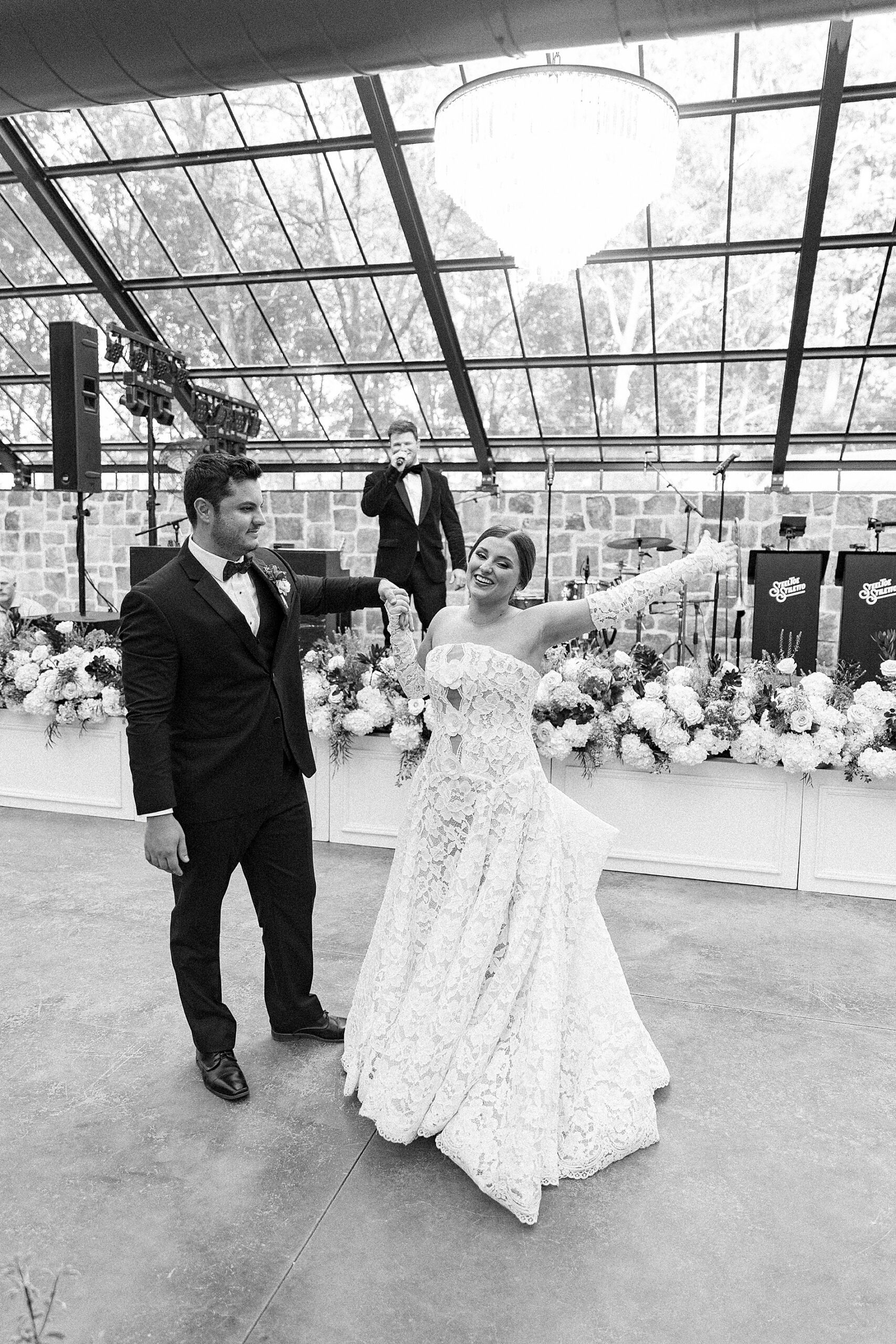 candid wedding portraits on dance floor 