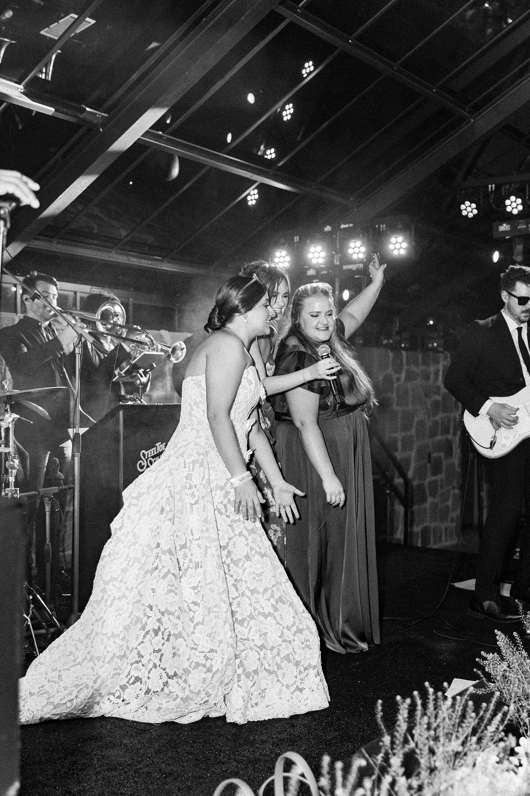 bride and bridesmaids on stage 
