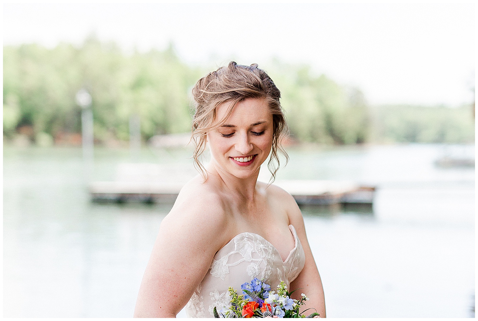 pier on the water location 👰 Bride: lace wedding dress + veil 💐 Colorful orange and blue bouquet 📸 Outdoorsy Lake and Mountain Bridal Session with Julia | Kevyn Dixon Photography
