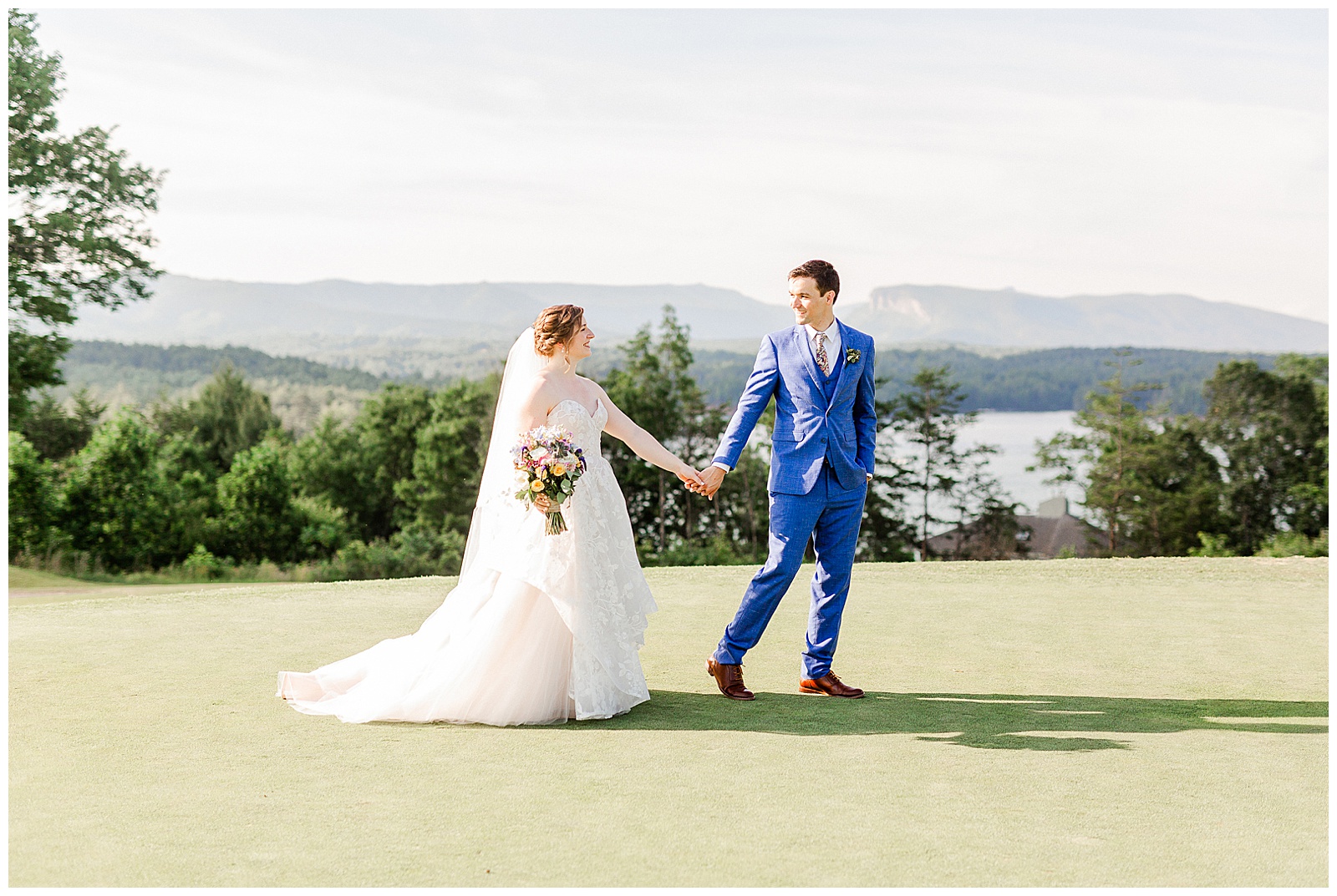 Stunning outdoor mountain photos of Bride and Groom from Outdoorsy Summer Wedding at North Carolina Lakehouse | check out the full wedding at KevynDixonPhoto.com