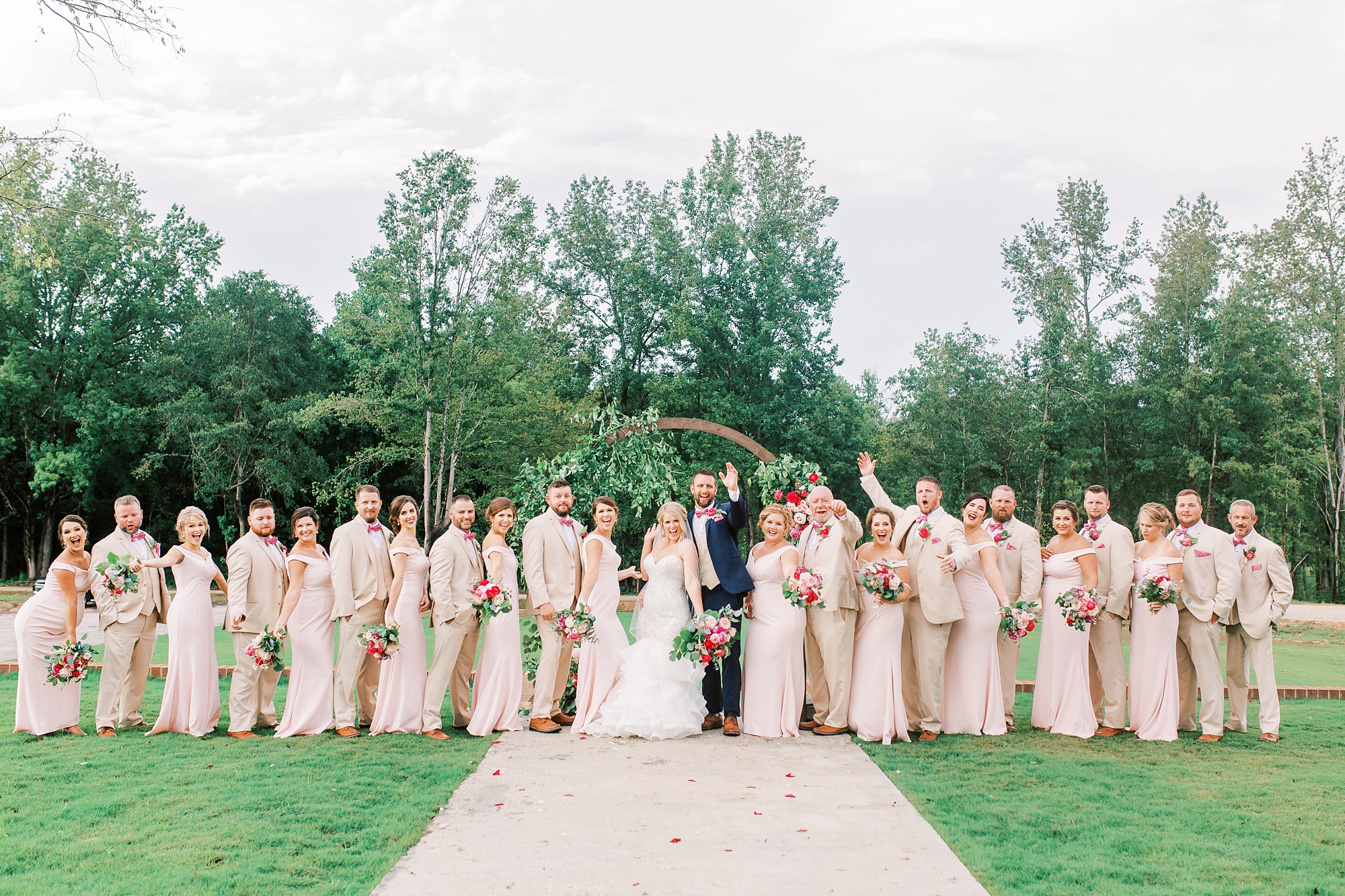 South Carolina wedding party poses with bride and groom
