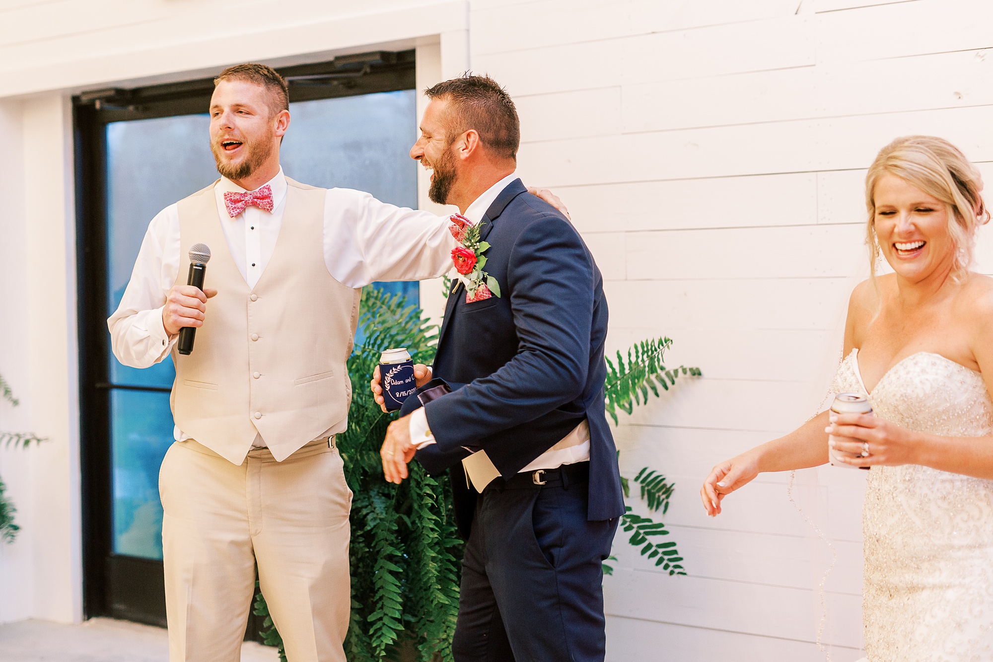 groomsmen gives speech during wedding reception