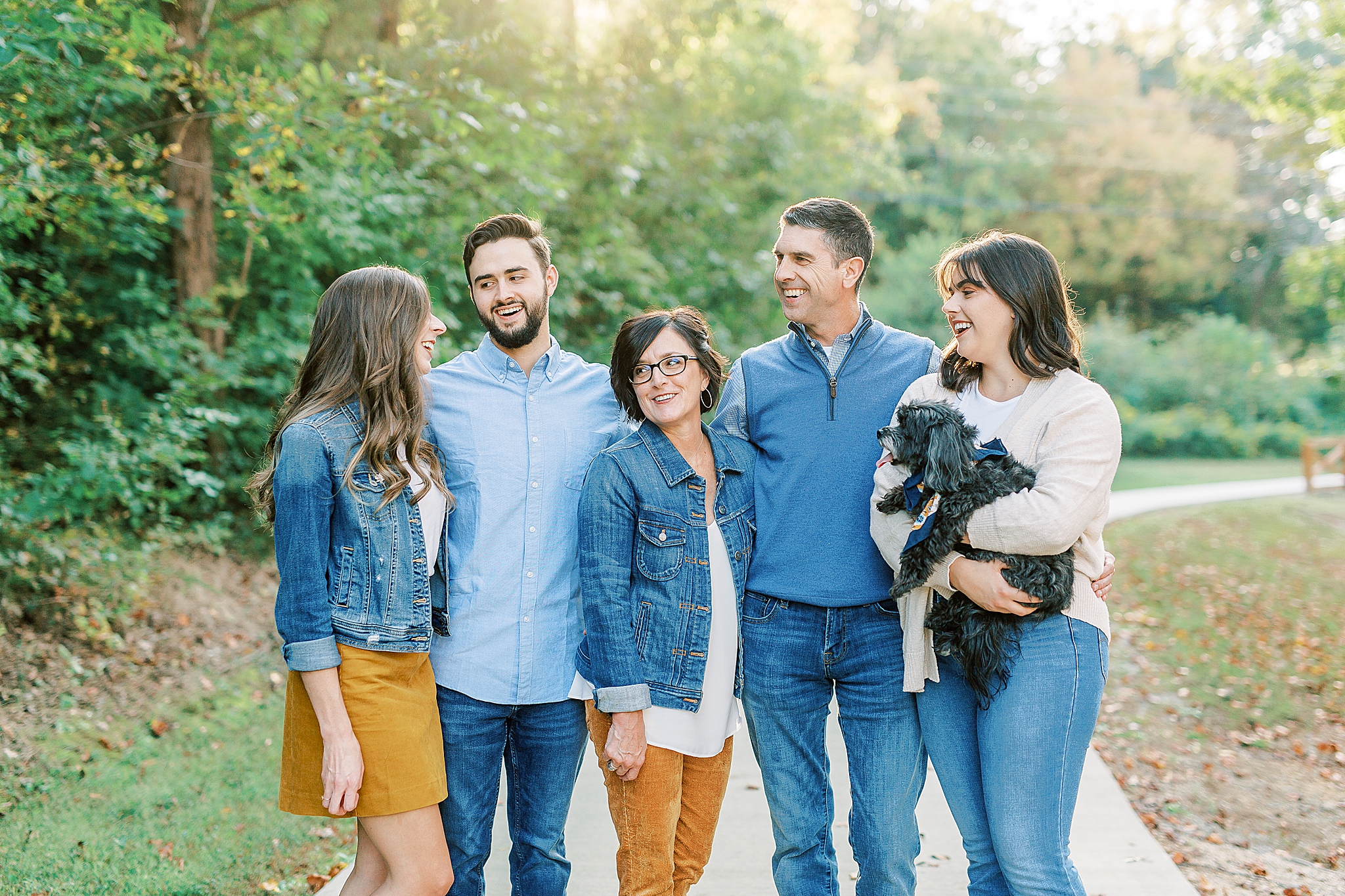 family looks at each other during NC family portraits