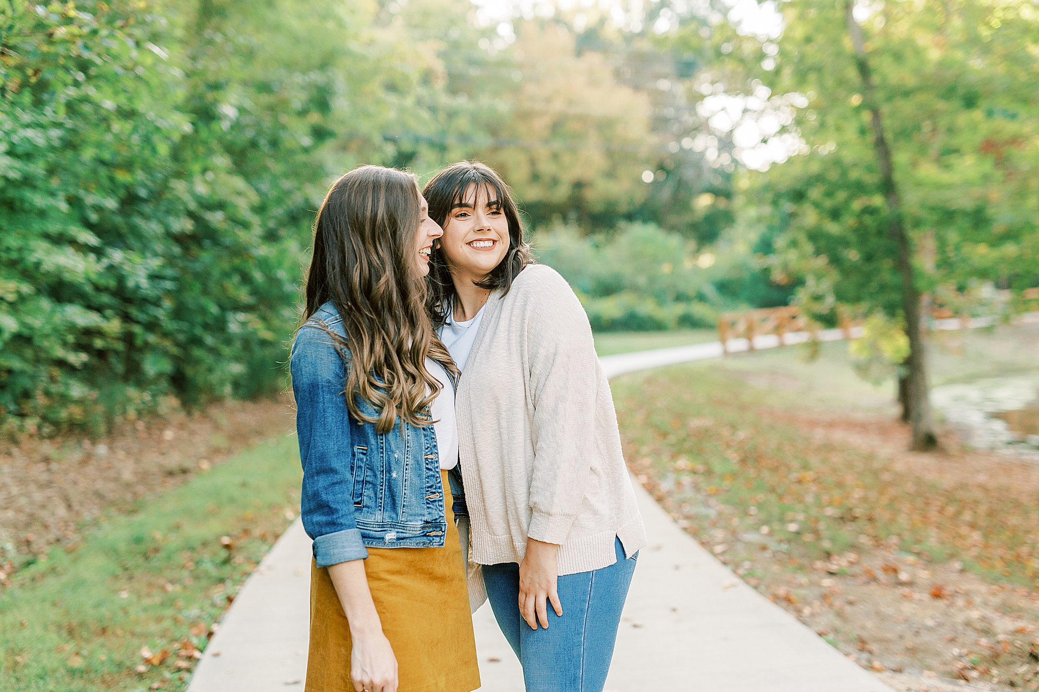 sisters laugh during Charlotte Fall Family Portraits