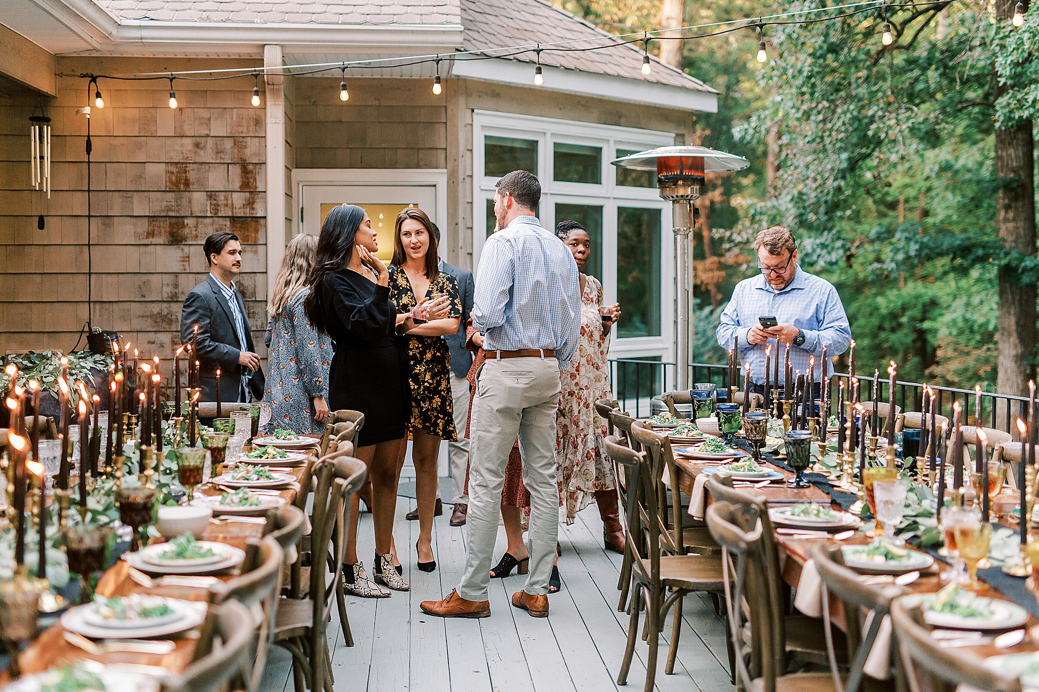 guests talk with each other during Charlotte NC Rehearsal Dinner