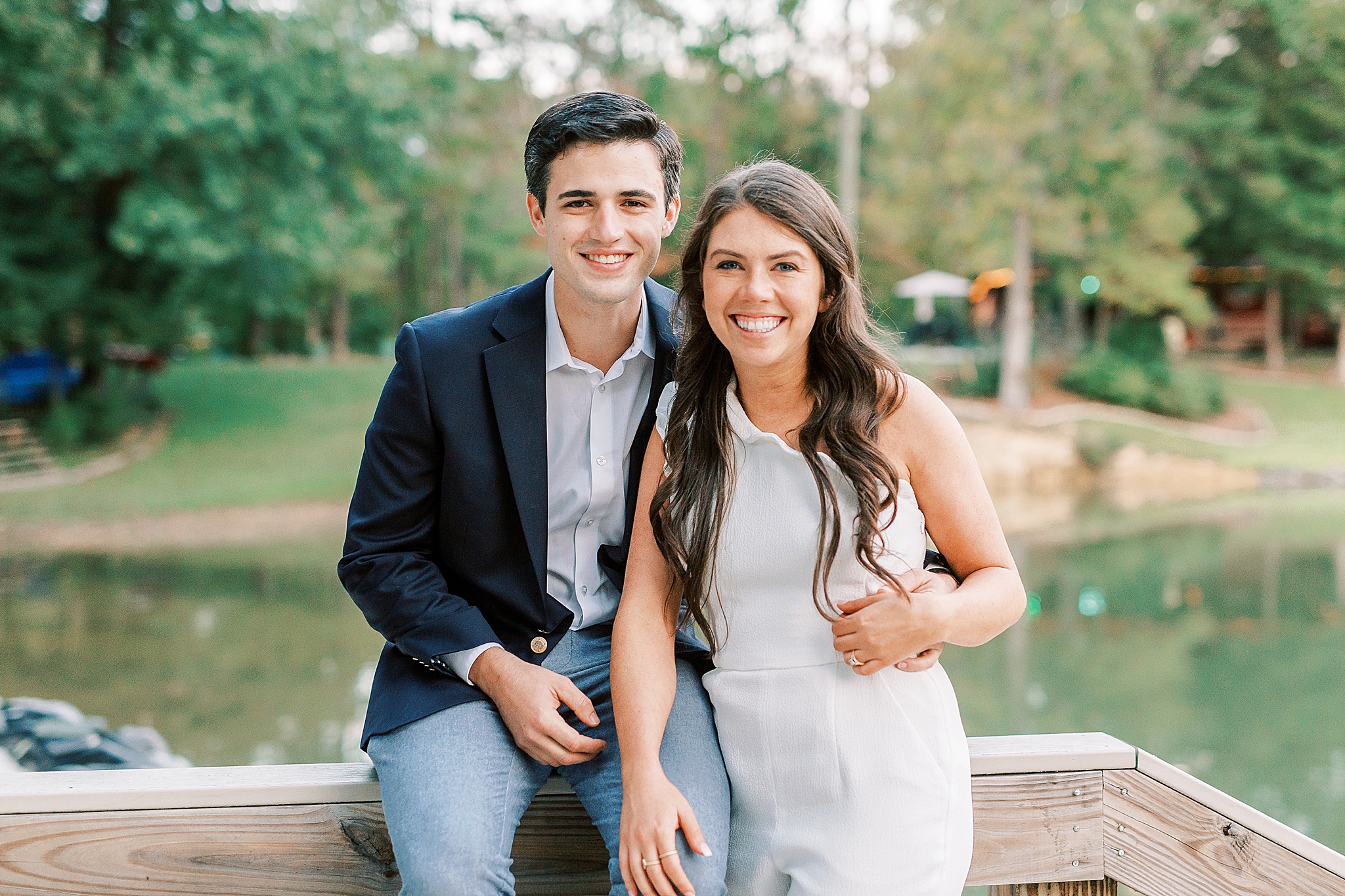 bride and groom laugh during rehearsal dinner portraits