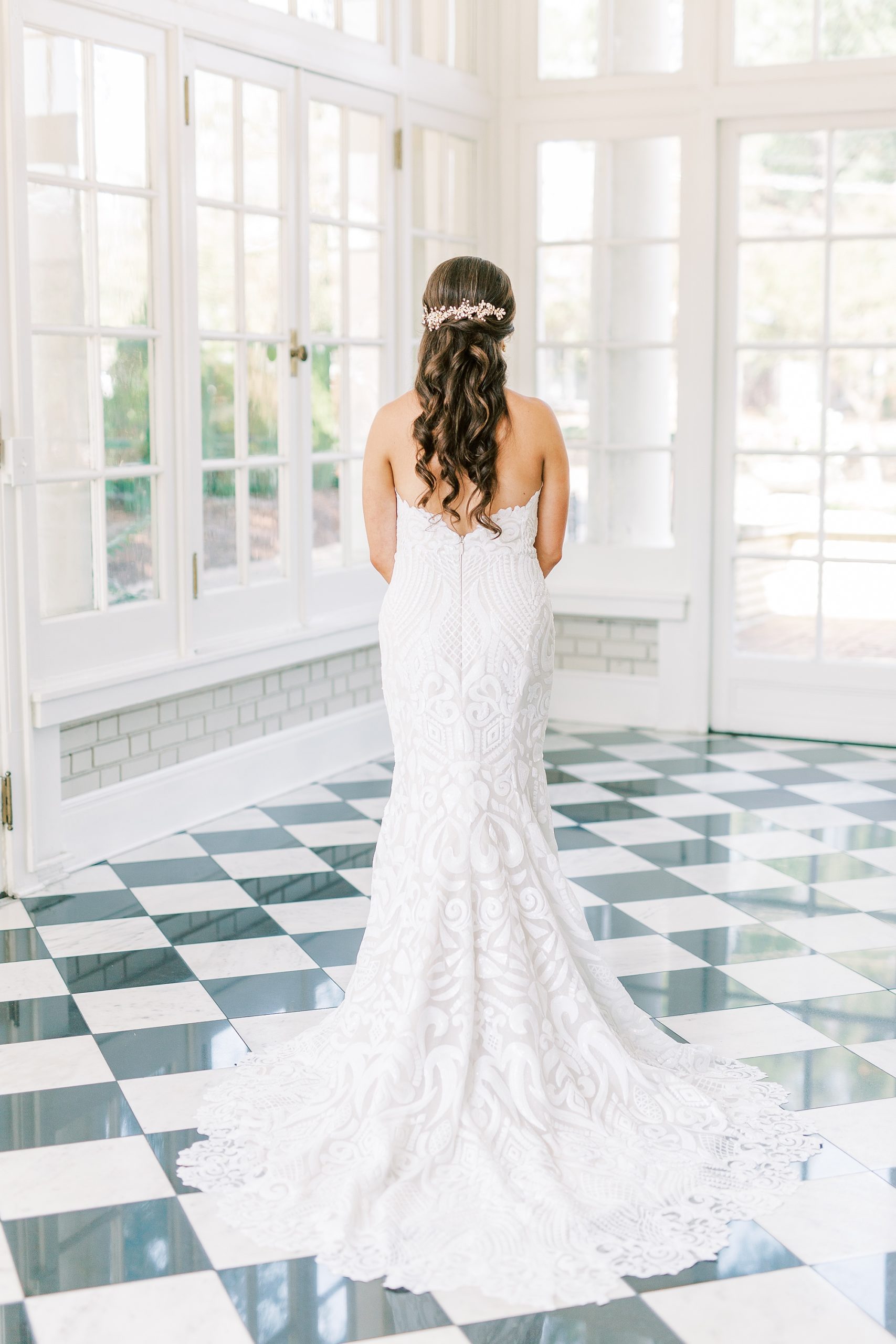 bride shows off back of lace gown at Separk Mansion