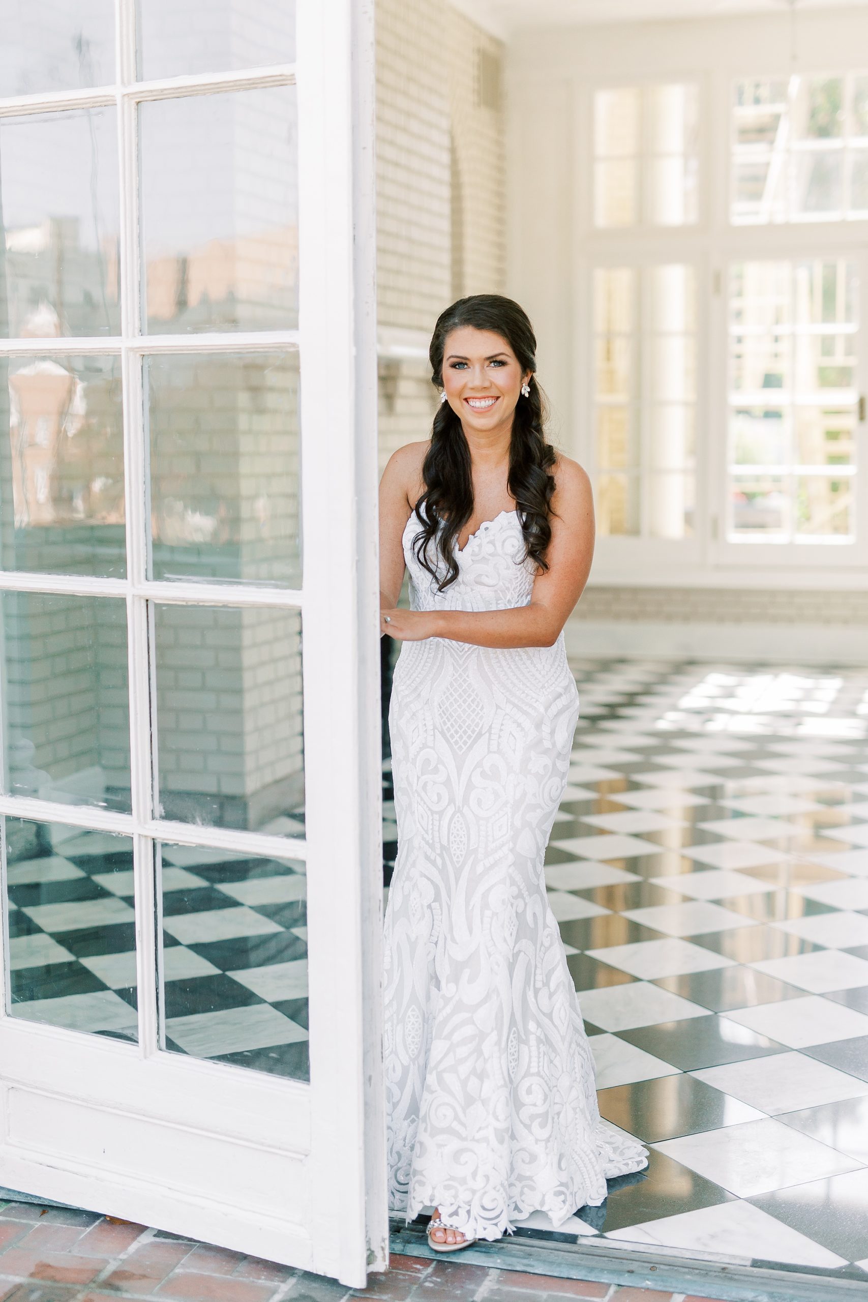 bride poses by open door of Separk Mansion
