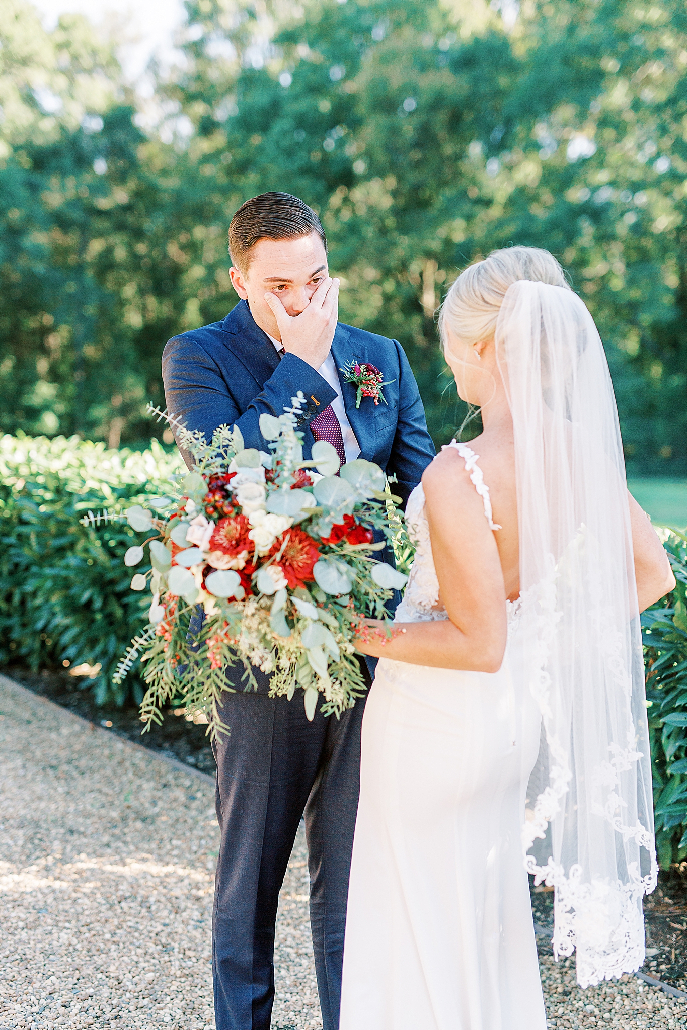 groom cries during first look with bride