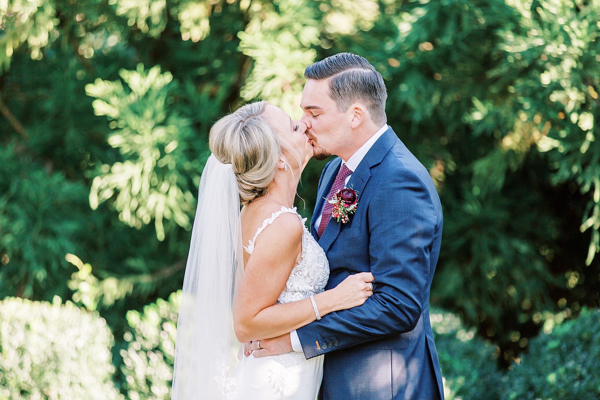 bride and groom kiss after NC wedding ceremony
