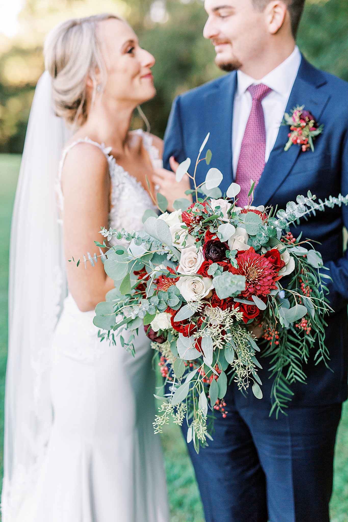 bride holds fall bouquet during Andrews Farm elopement
