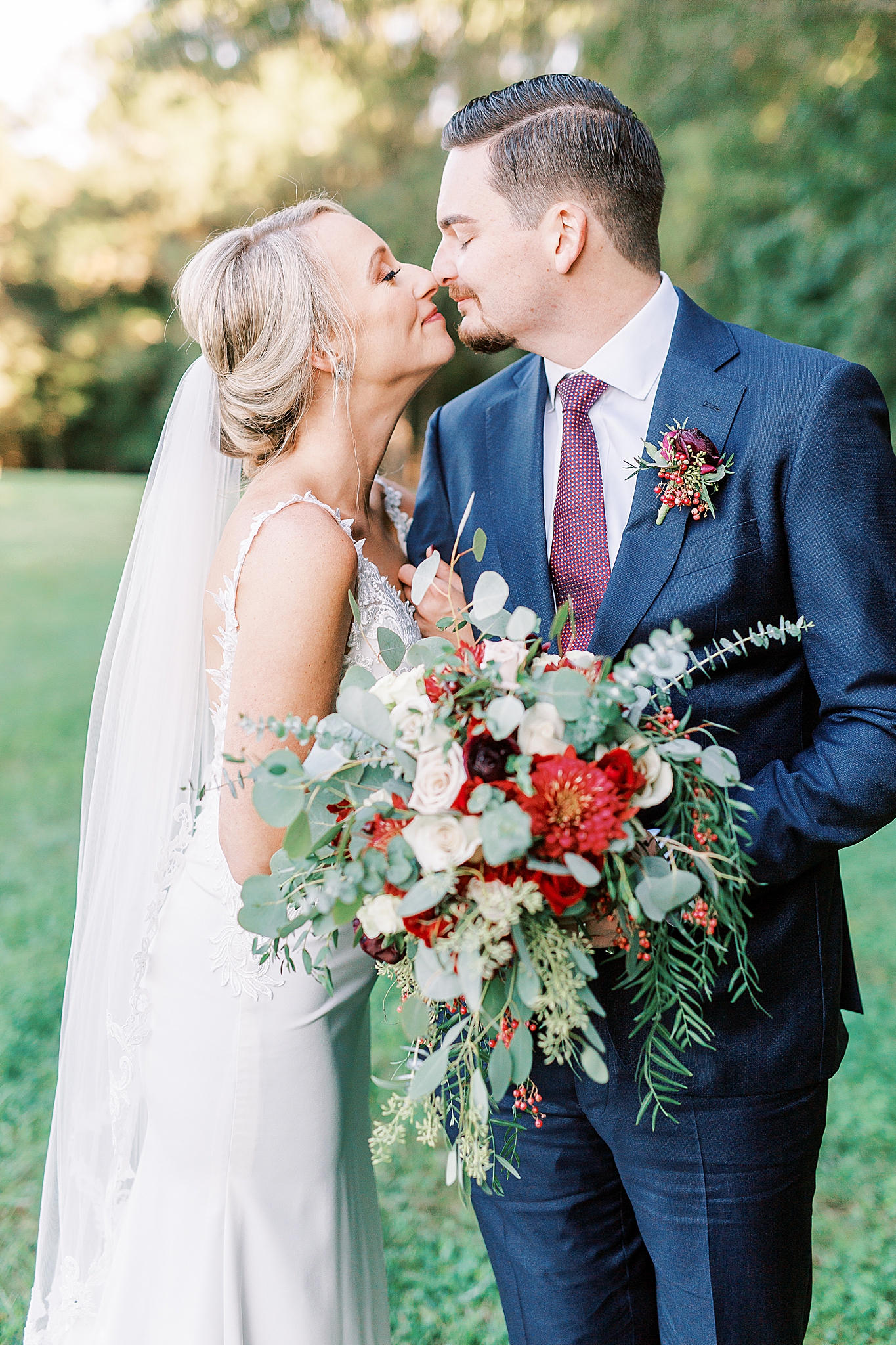 bride and groom touch noses during NC wedding photos