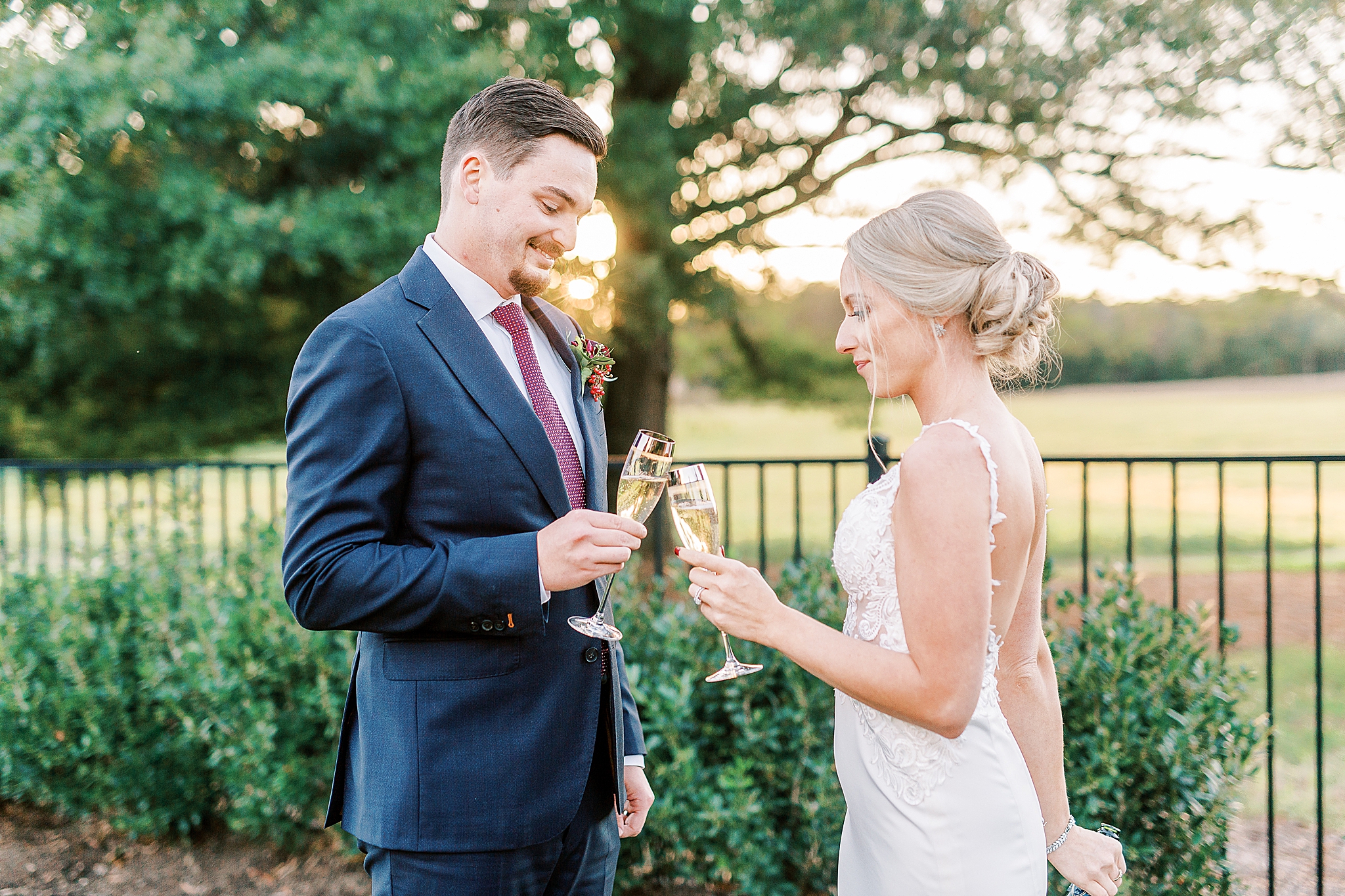 bride and groom toast elopement with champagne