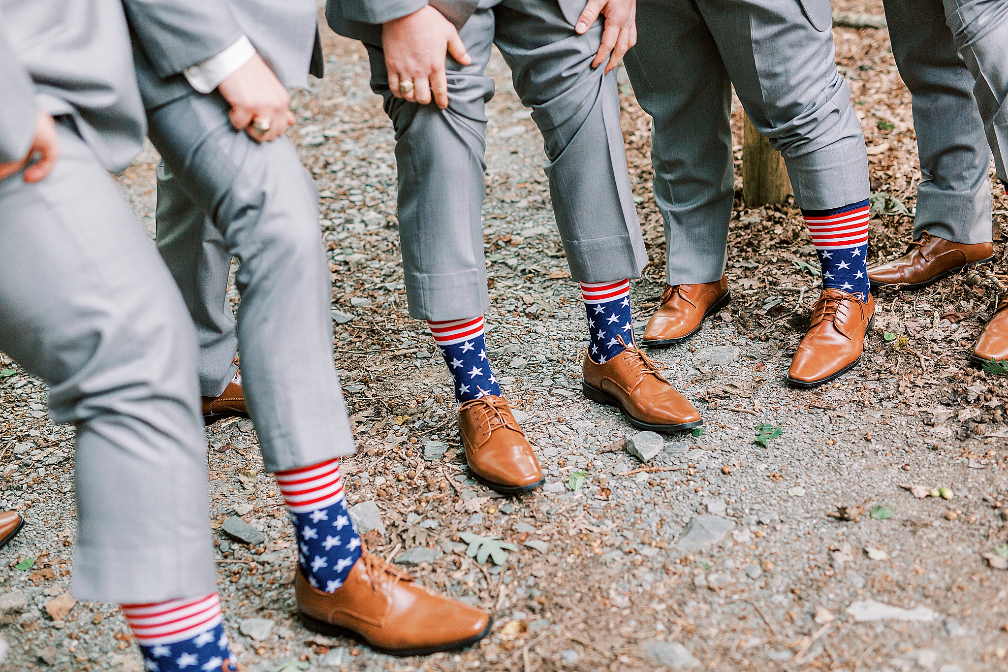 groomsmen show off custom socks