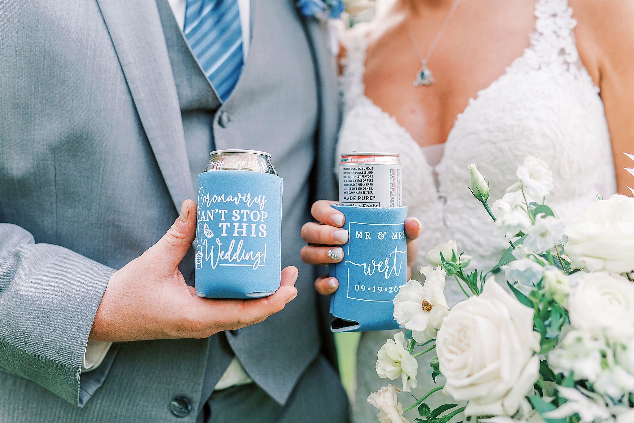 newlyweds toast wedding day with beer