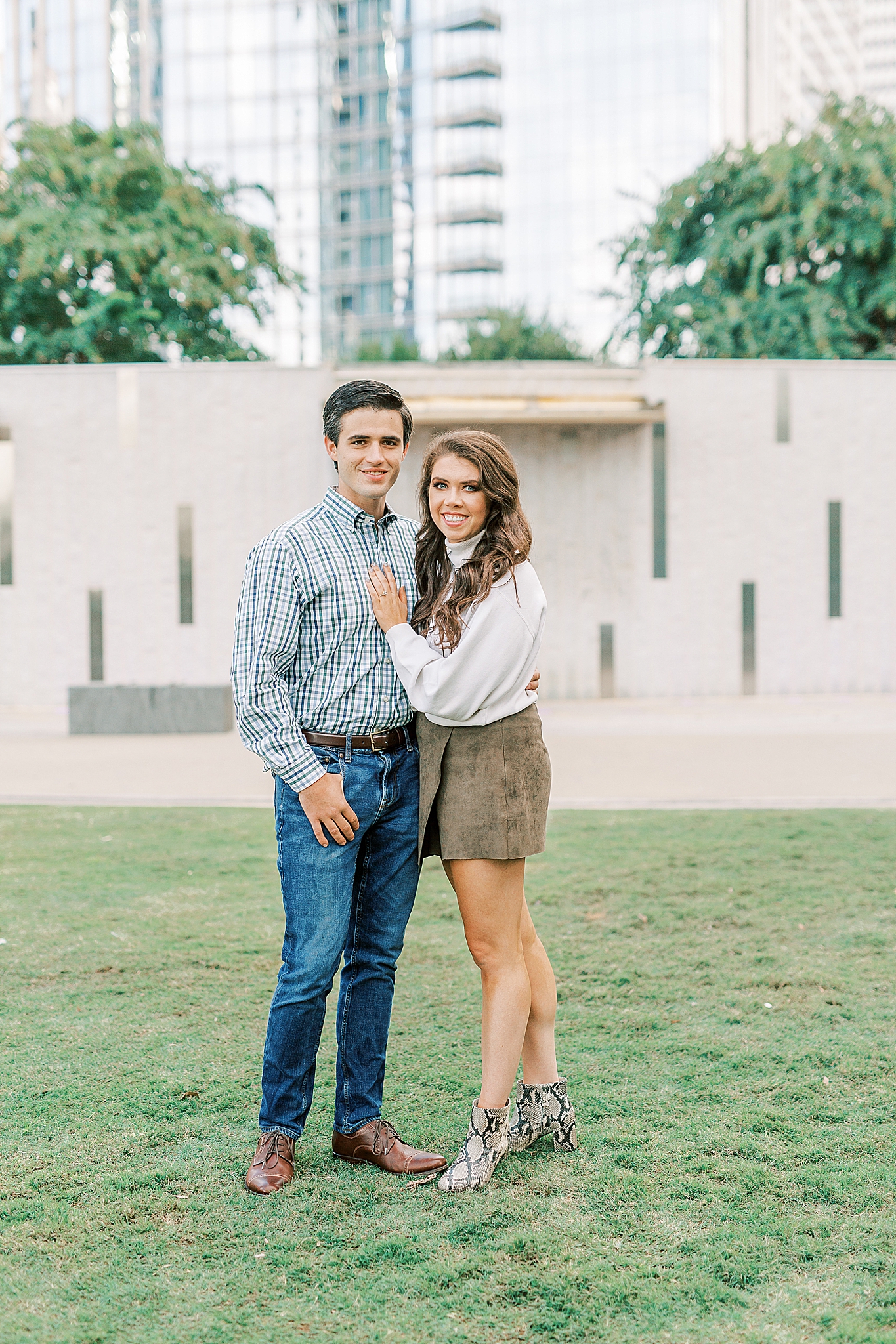 engaged couple poses in Charlotte NC