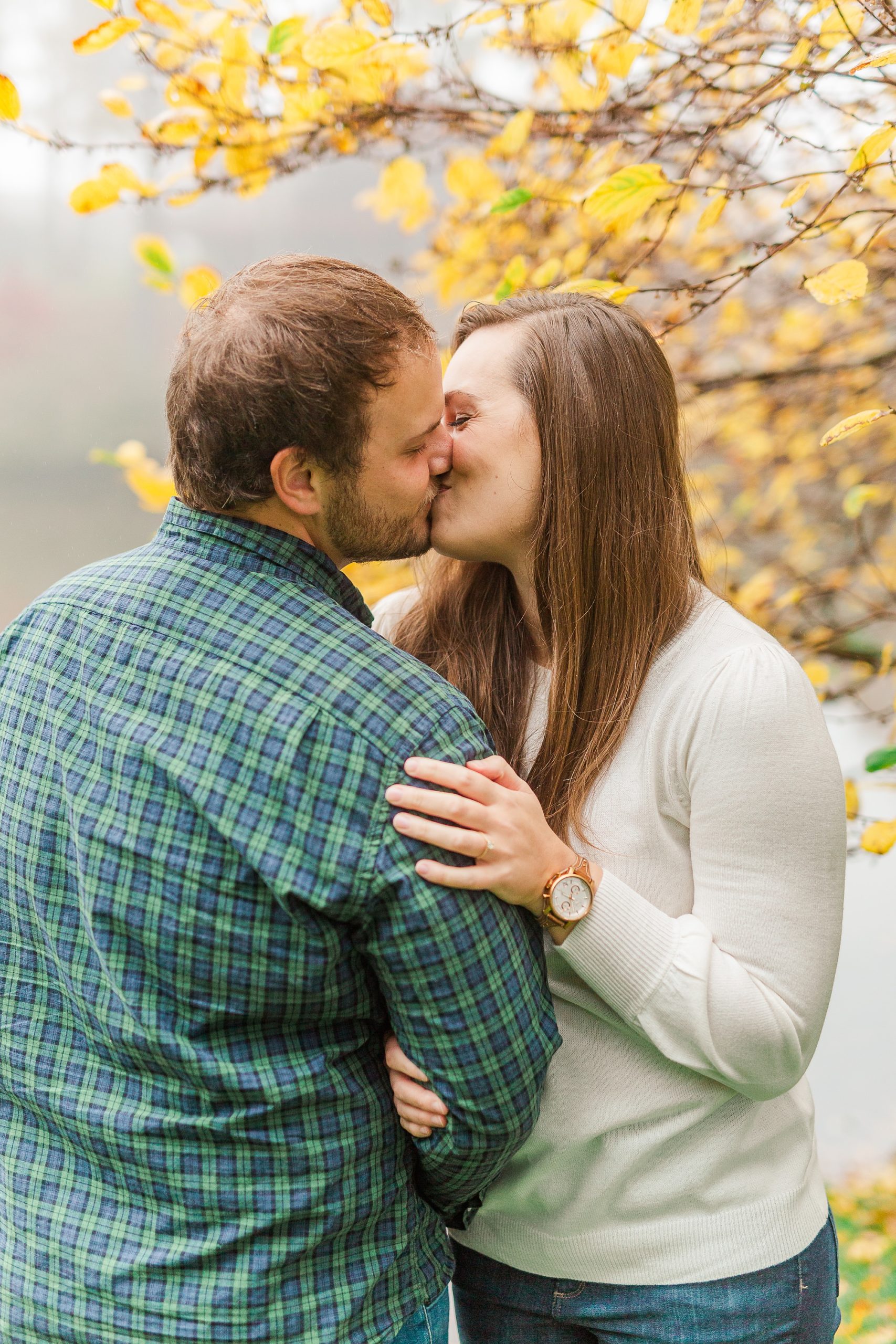 bride and groom kiss during NC engagement photos