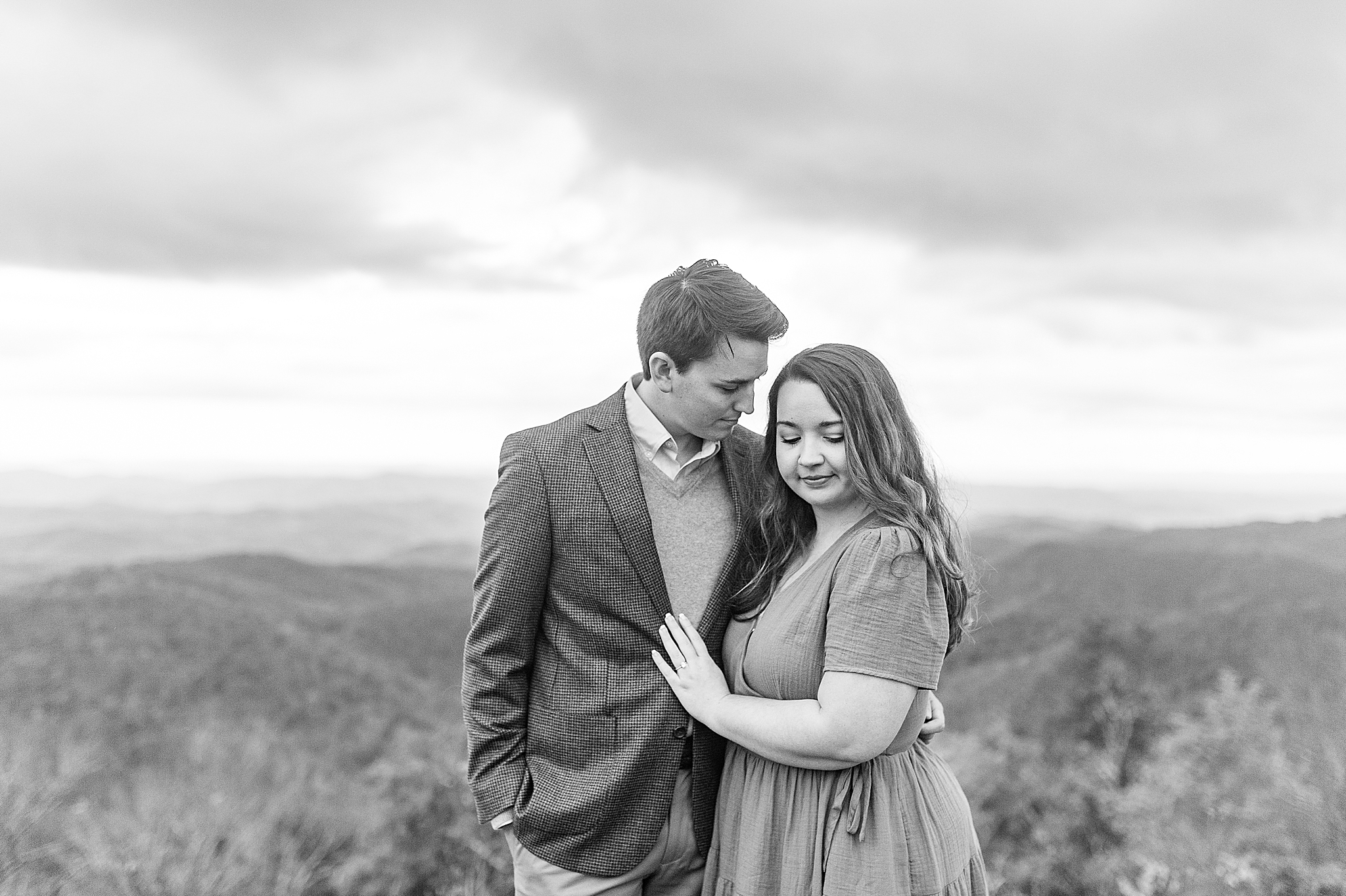 bride and groom poses together along Blue Ridge Parkway