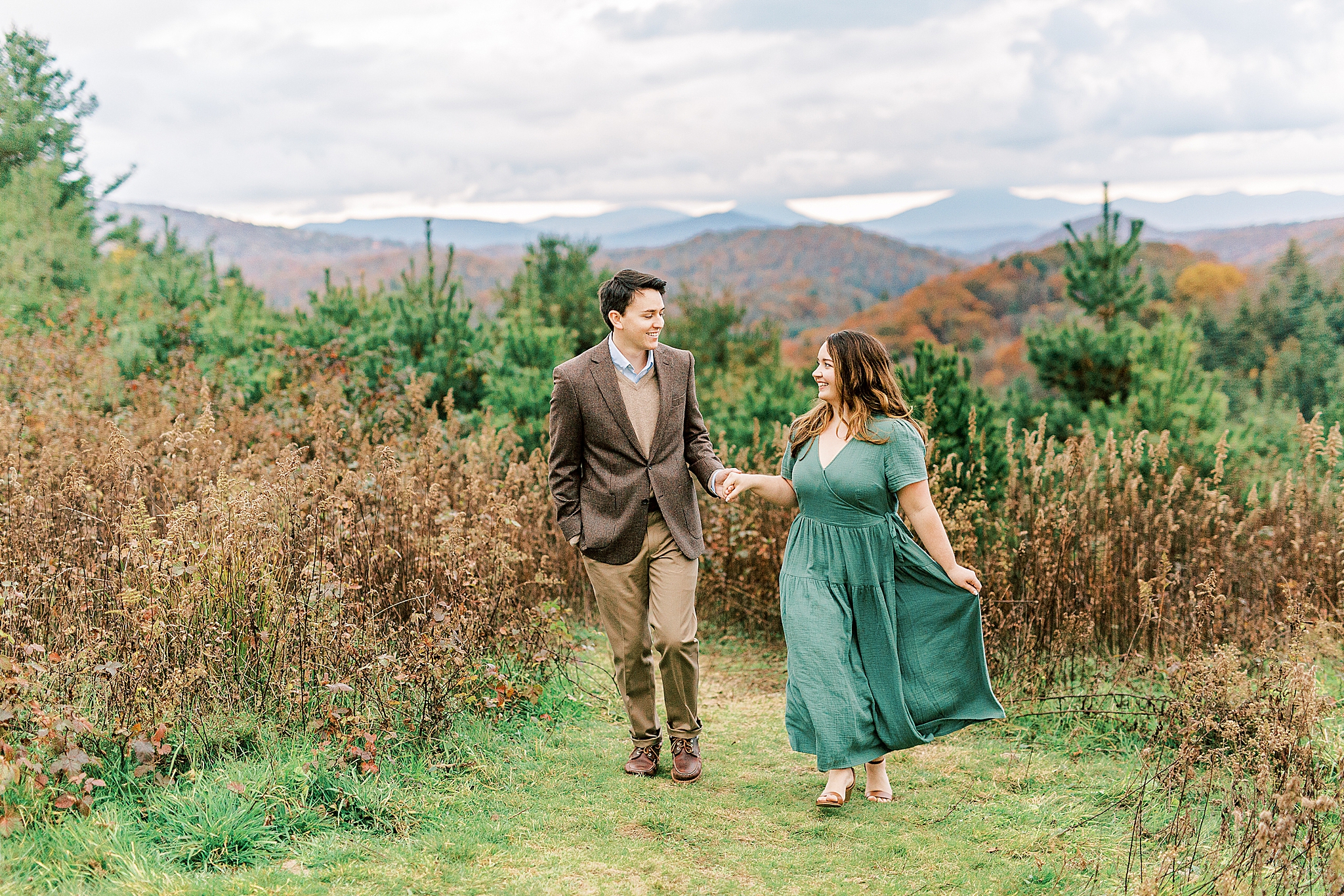 engagement portraits with fall mountains in background