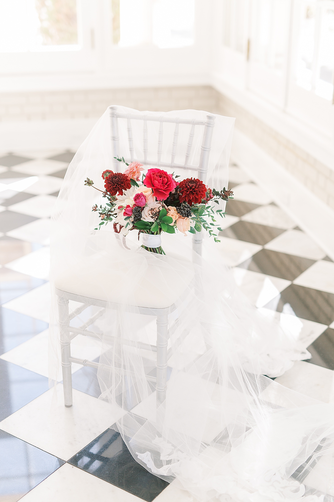 bride's bouquet rests on chair at Separk Mansion
