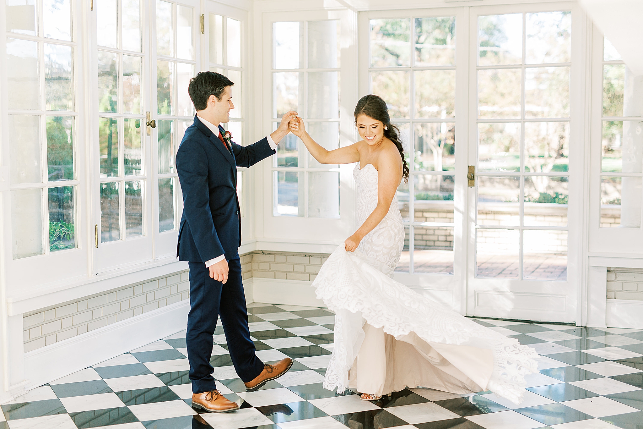 bride twirls wedding gown during portraits at Separk Mansion