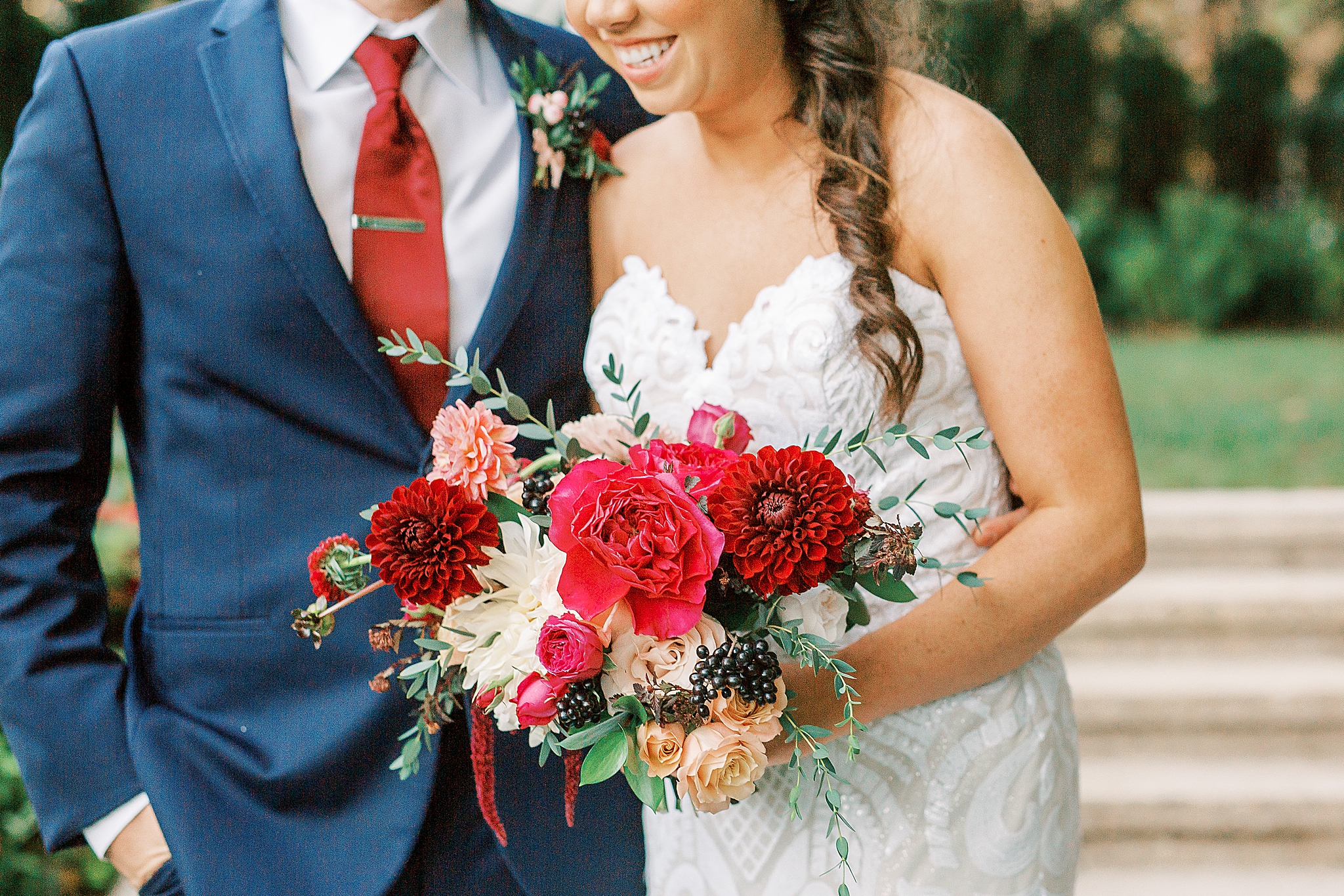 bride's bouquet with red and pink flowers for Separk Mansion wedding