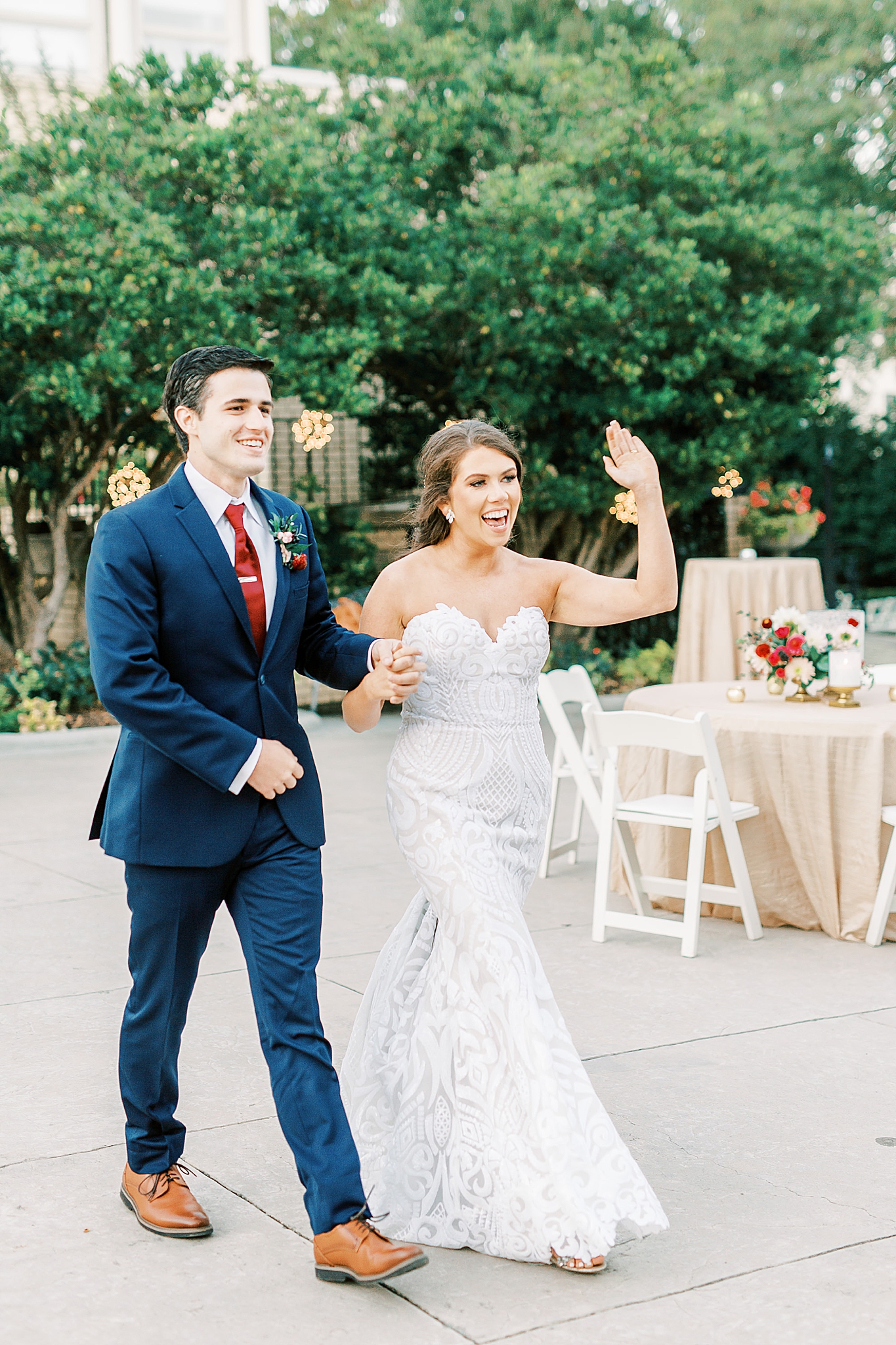 bride and groom enter Separk Mansion garden reception