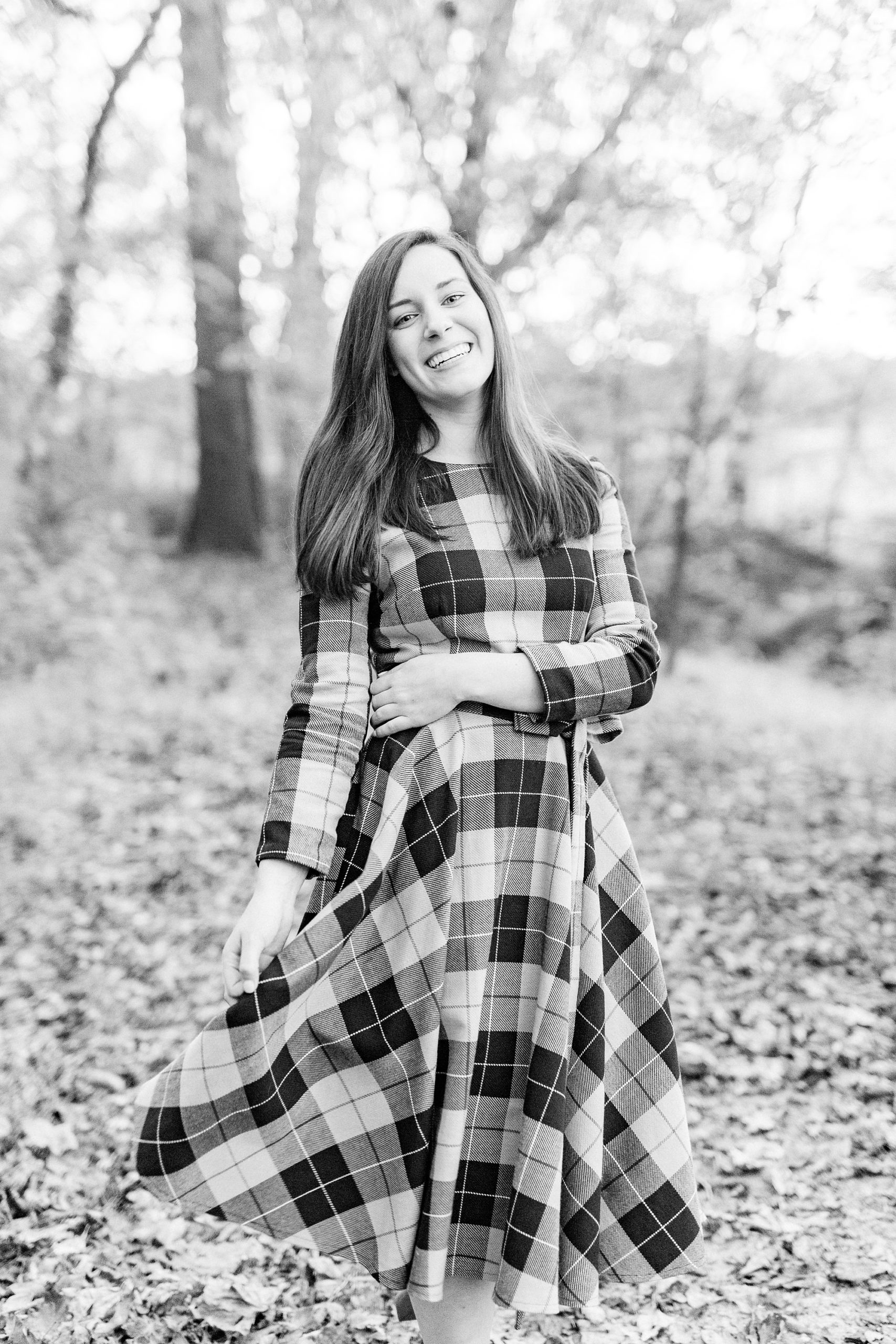 senior twirls in fall dress