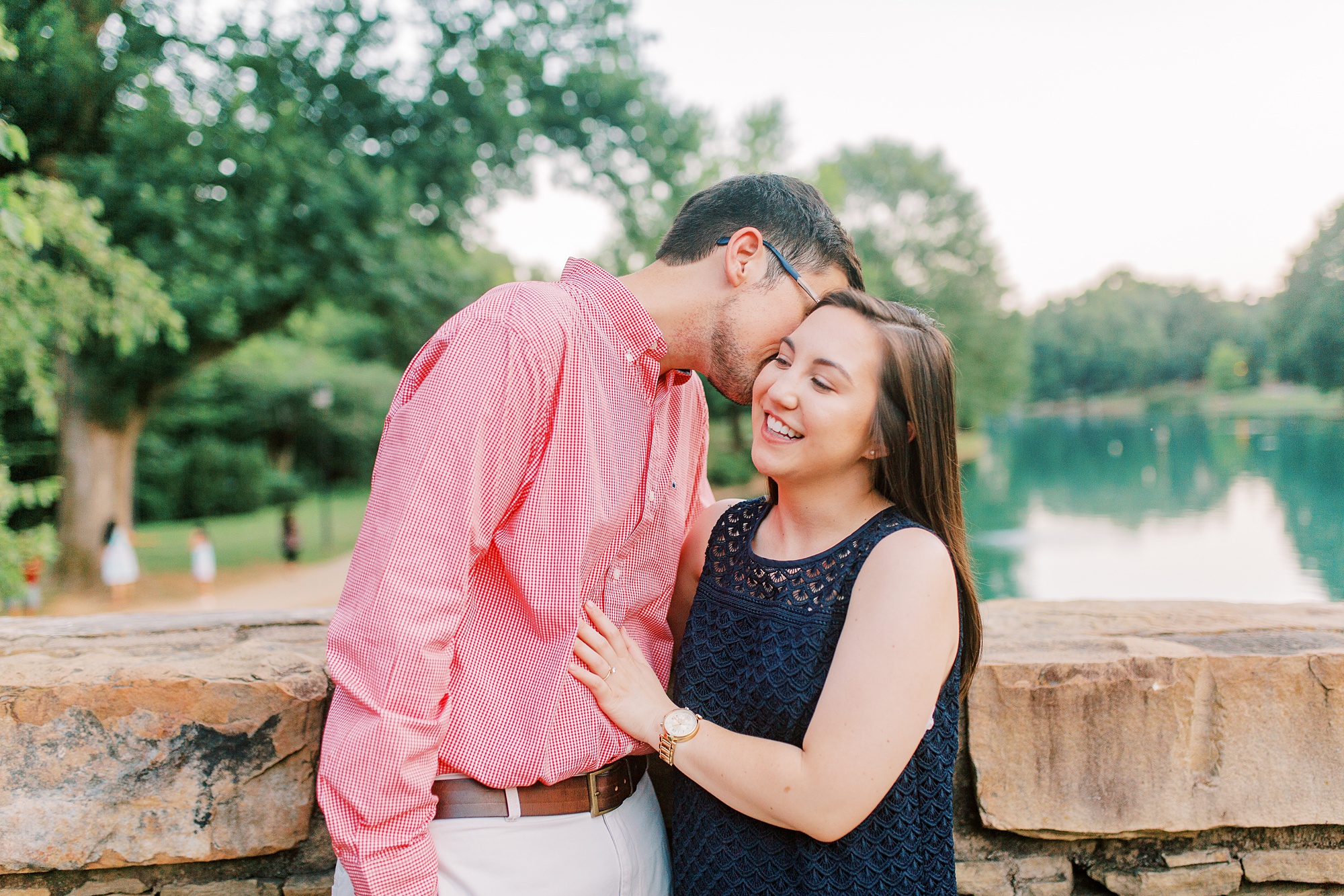 groom nuzzles bride's cheek during NC engagement photos