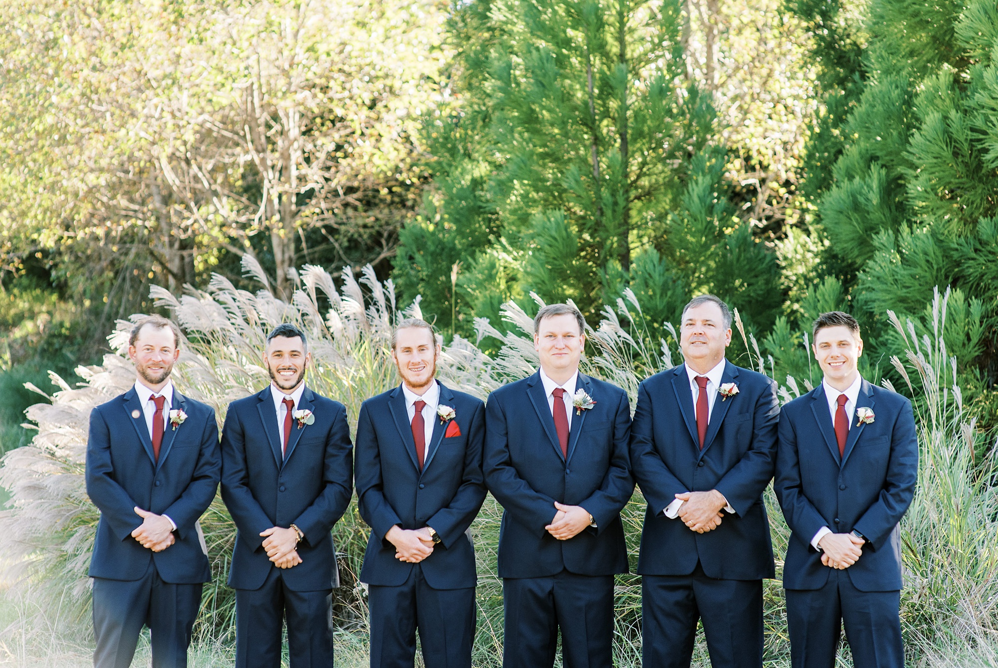 portraits of groom and groomsmen before the Arbors Events wedding