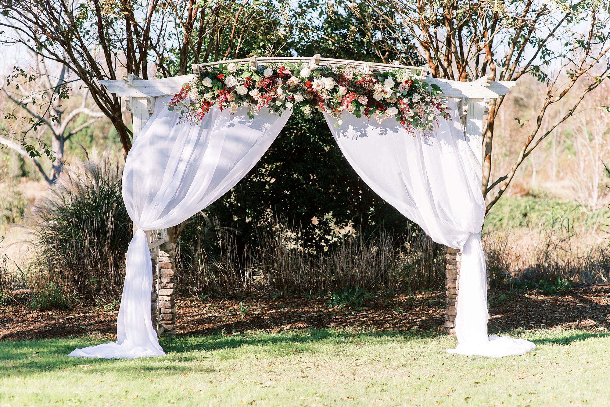 floral arbor for wedding at Arbors Events