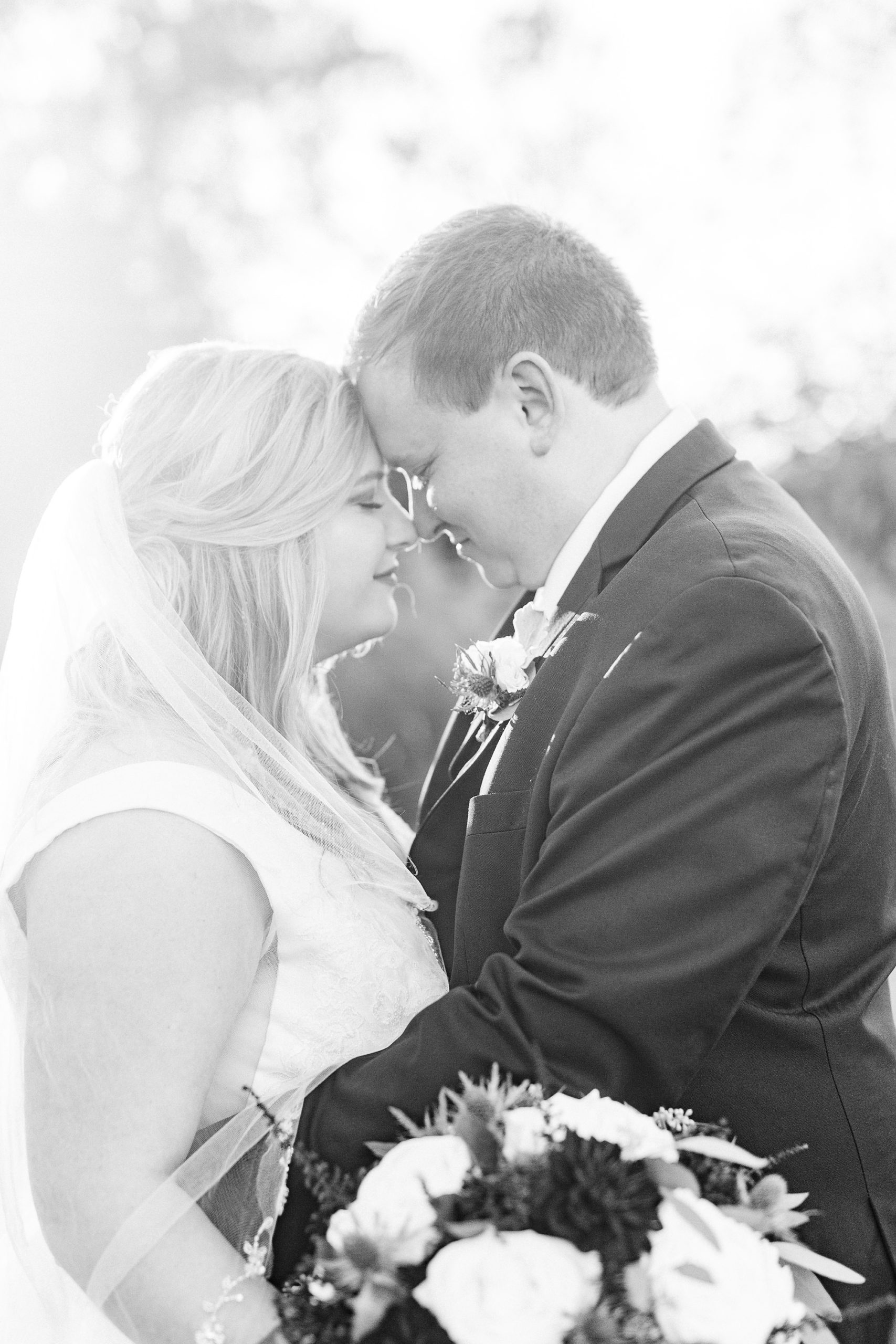 bride and groom touch foreheads during the Arbors Events photos