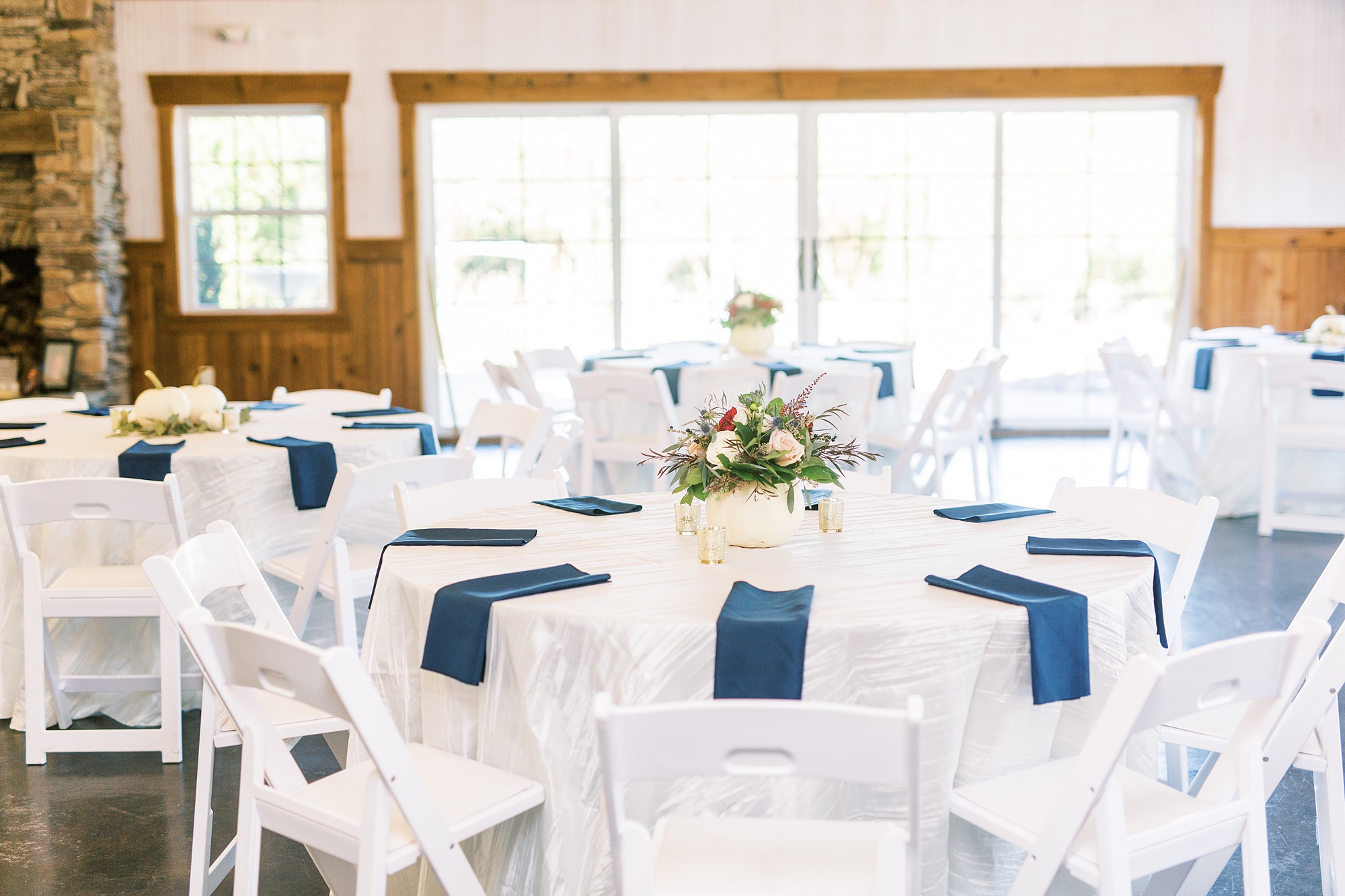 wedding reception at the Arbors Events with white and navy details