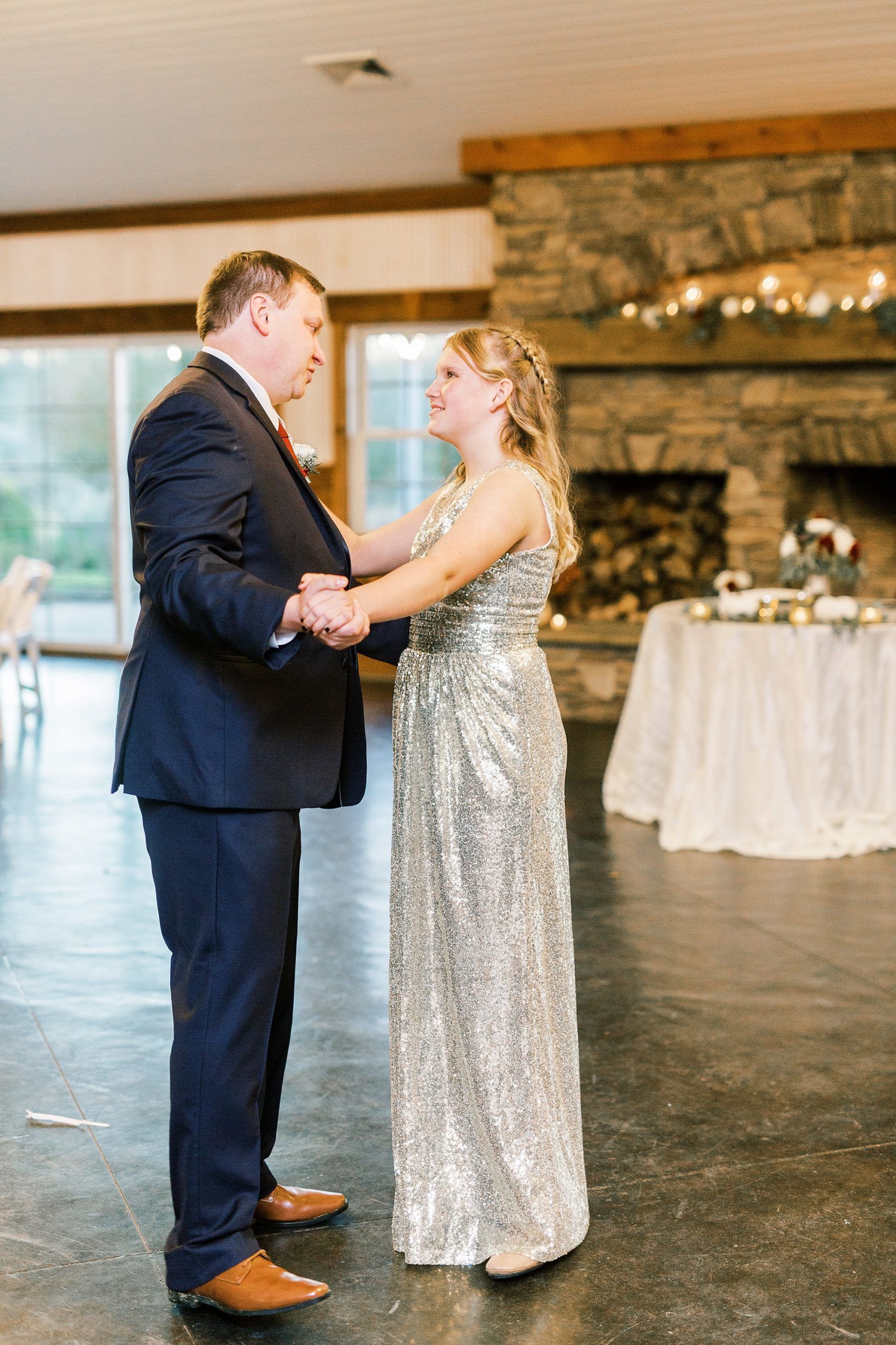 groom dances with daughter during NC wedding reception