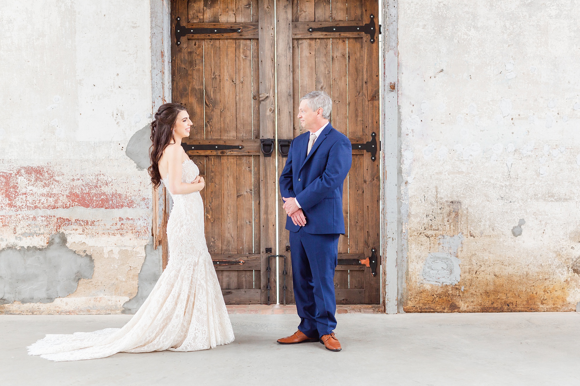 first look for bride and dad at Providence Cotton Mill
